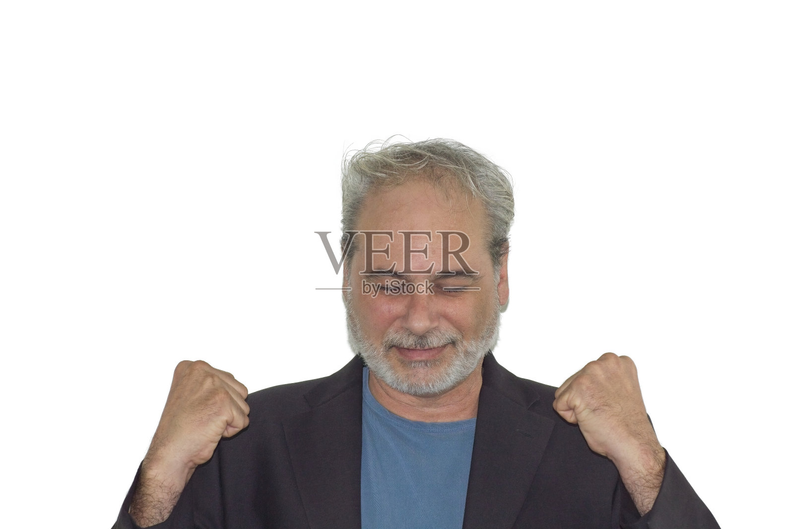 前景肖像的一个成熟的男子与胡子庆祝与举起拳头在白色背景照片摄影图片