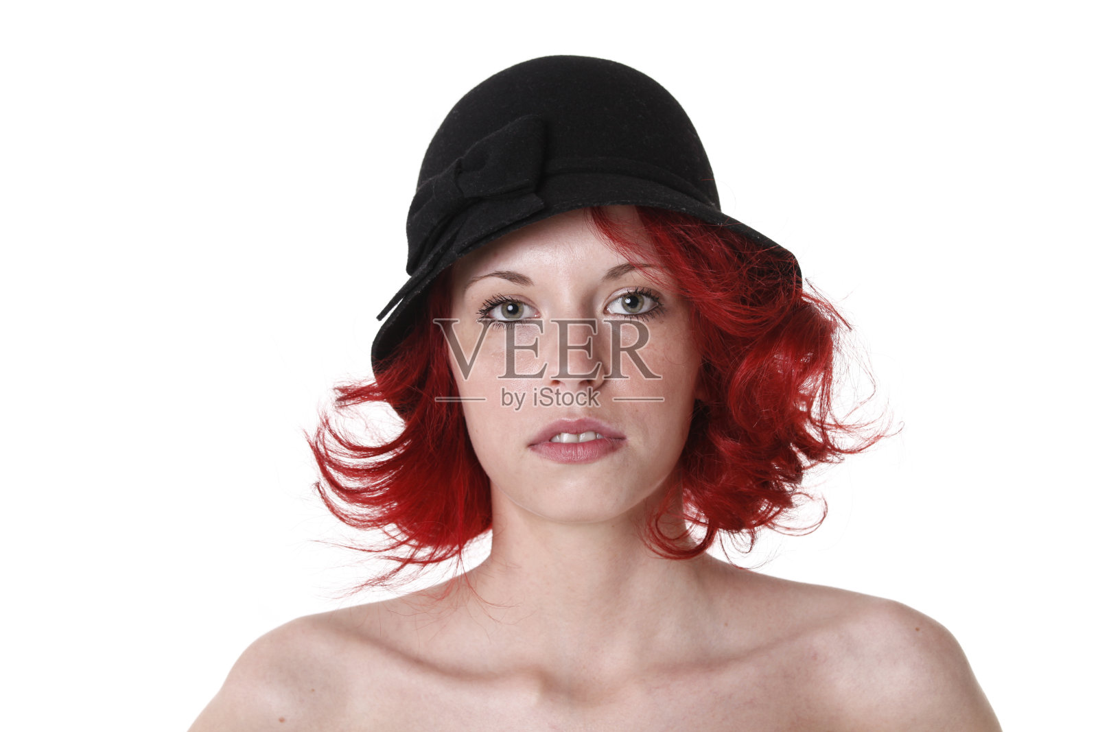 美丽的红发女孩在帽子的肖像照片摄影图片
