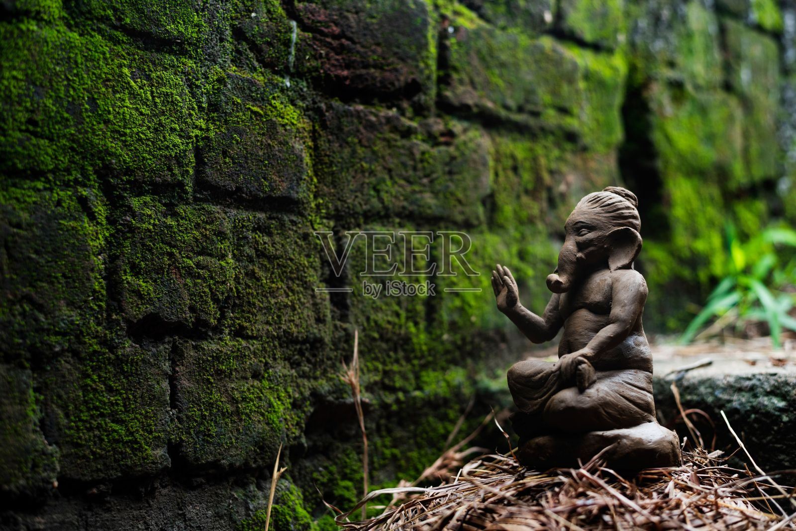 未完成的甘尼萨泥塑照片摄影图片