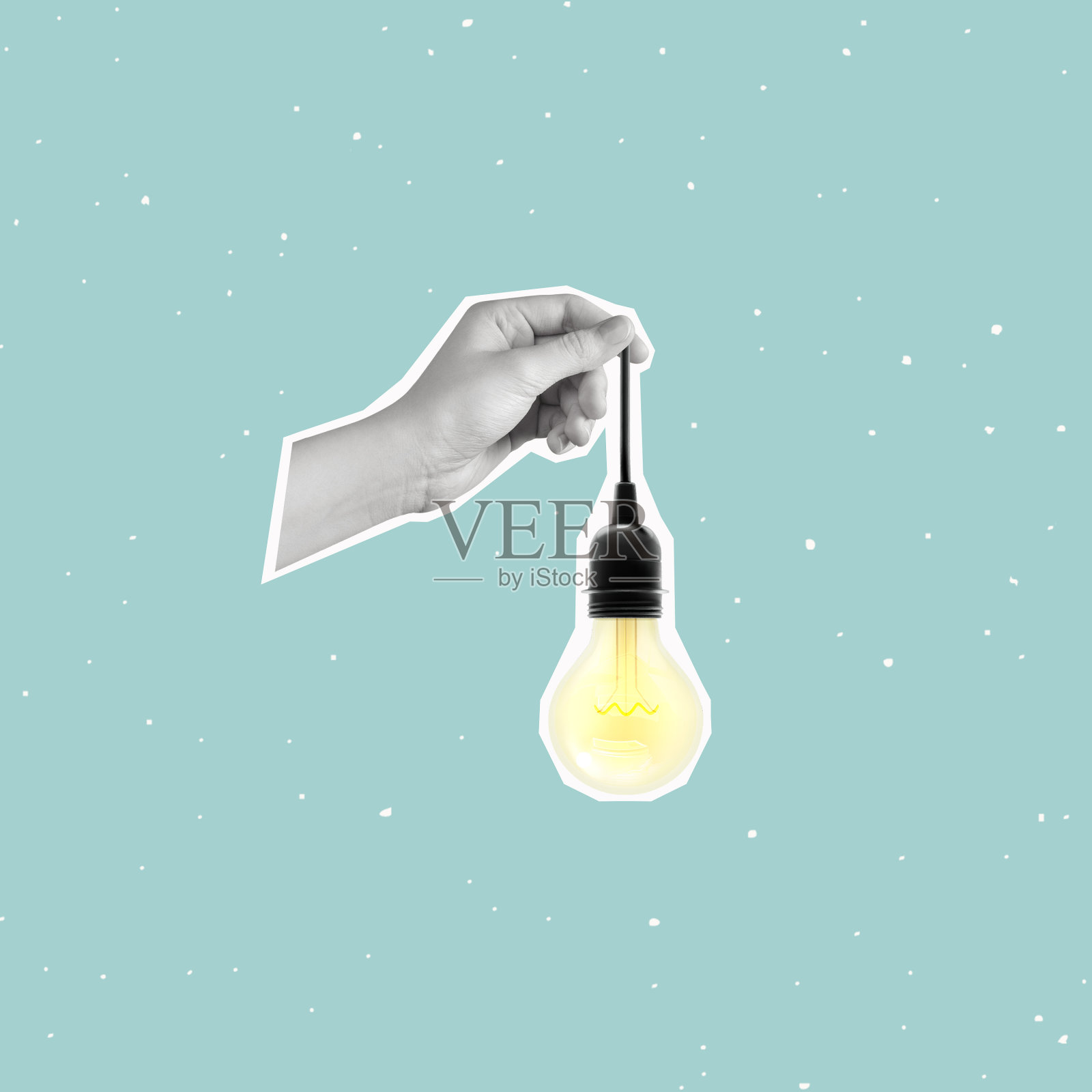 Сontemporary art collage of a hand holding a light bulb.照片摄影图片