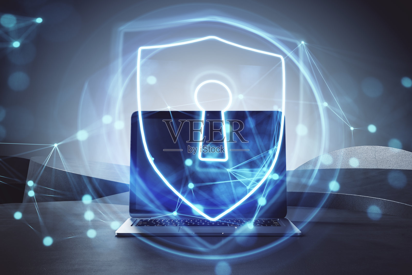 接近笔记本电脑与发光的安全挂锁盾牌全息图在模糊的背景。保护、安全、互联网理念。双重曝光。照片摄影图片