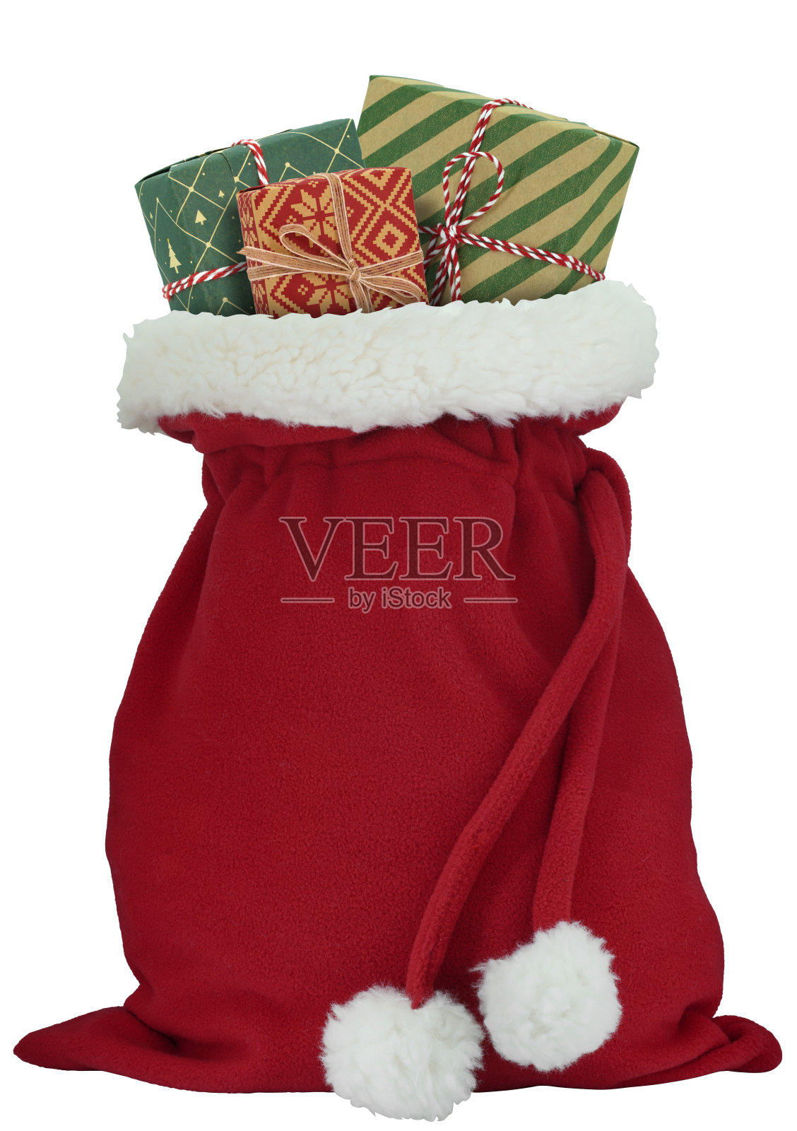 圣诞老人装满礼物的麻袋里的礼物在圣诞节的时候孤立在白色上照片摄影图片