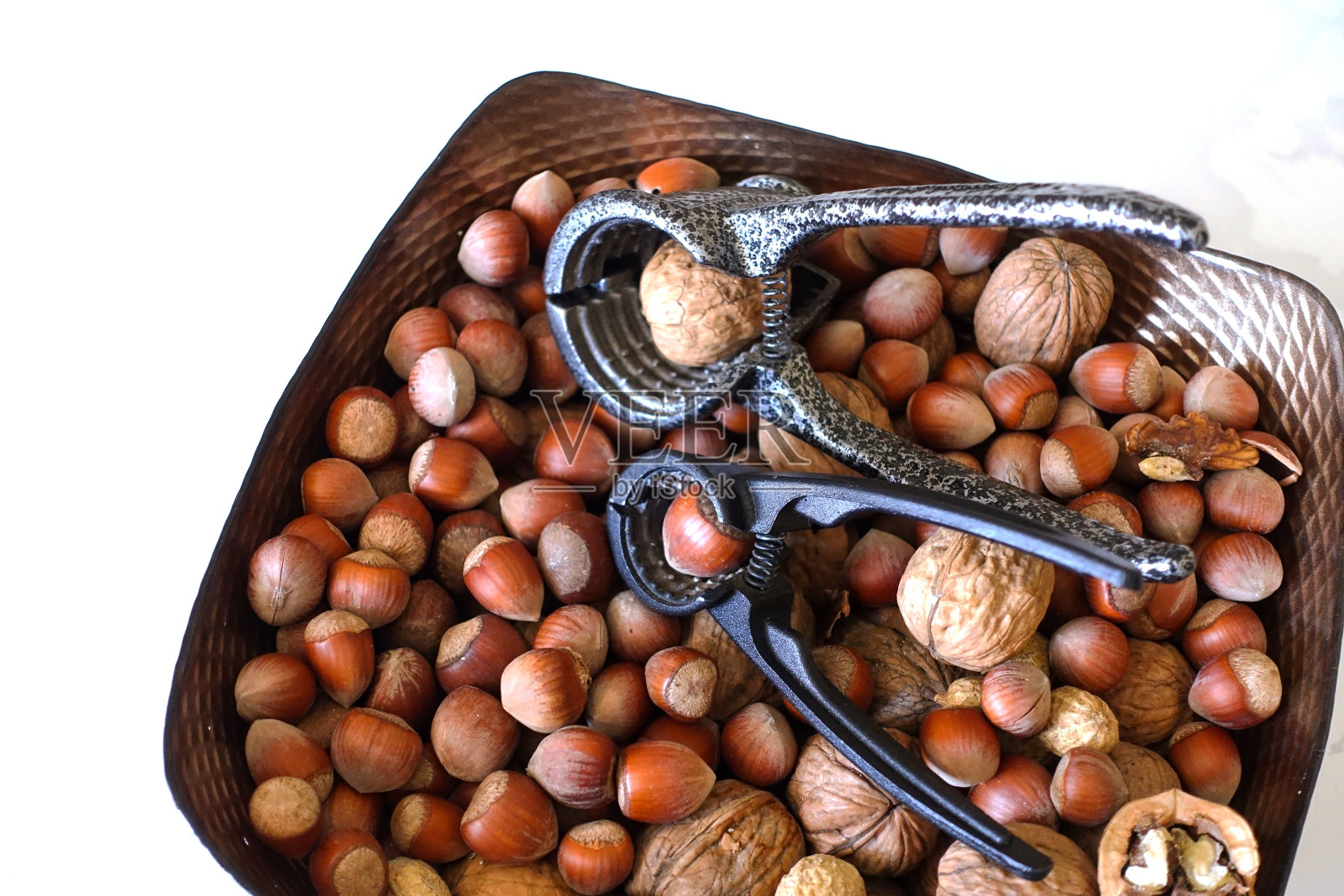 榛子和胡桃壳裂解装置,照片摄影图片