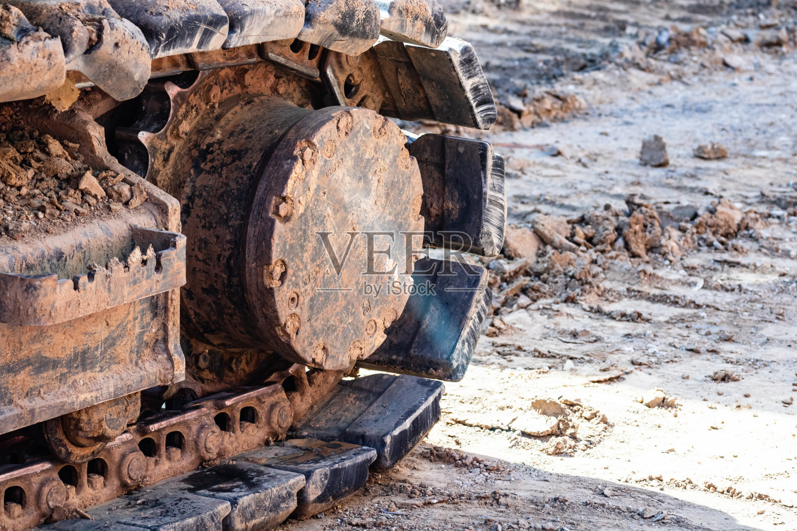 工业挖掘机在建筑工地工作的细节照片摄影图片