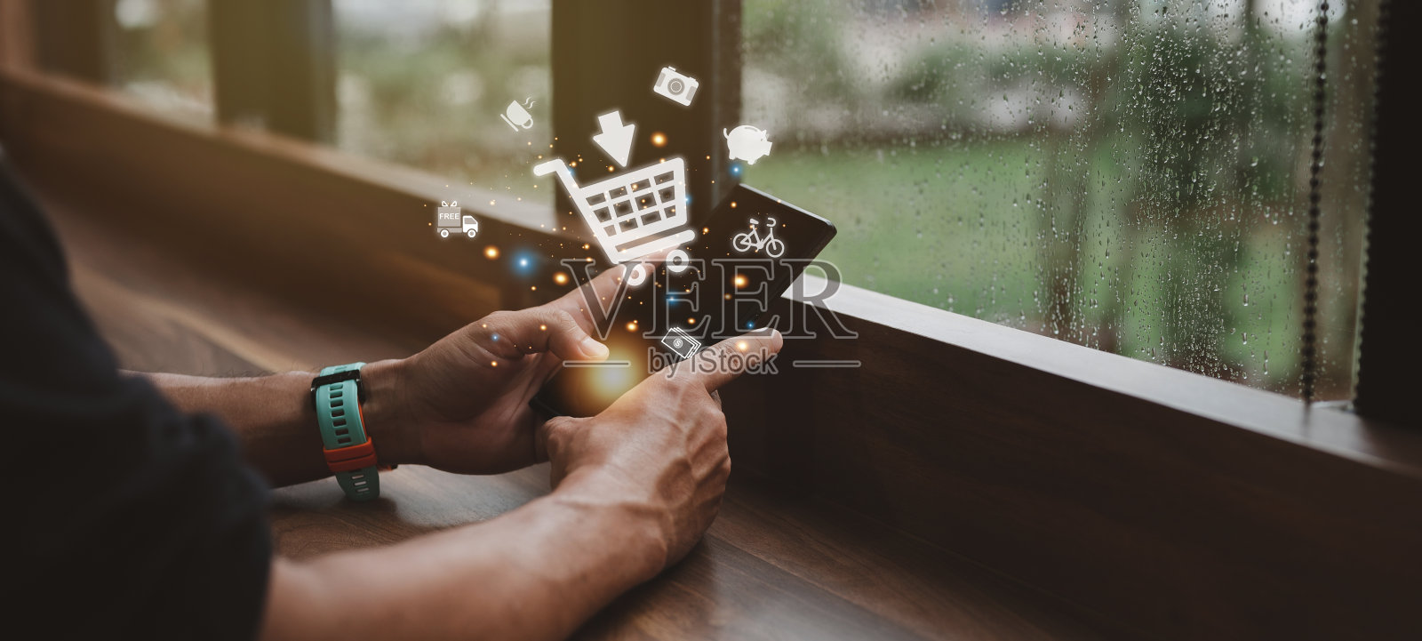 手持虚拟信息图形与手推车图标照片摄影图片