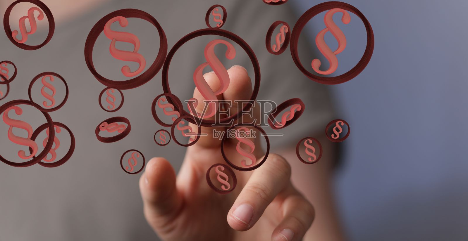 特写说明法律保护权利符号附近的一只手照片摄影图片