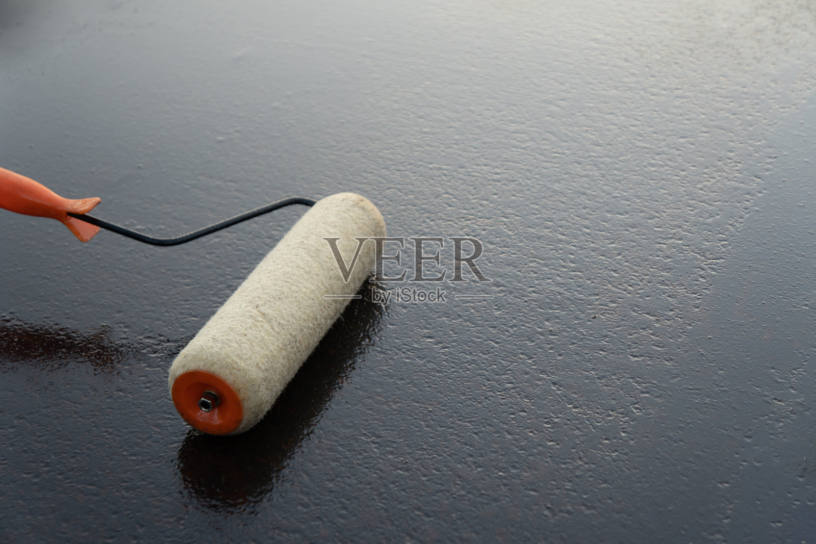 滚刷漆照片摄影图片