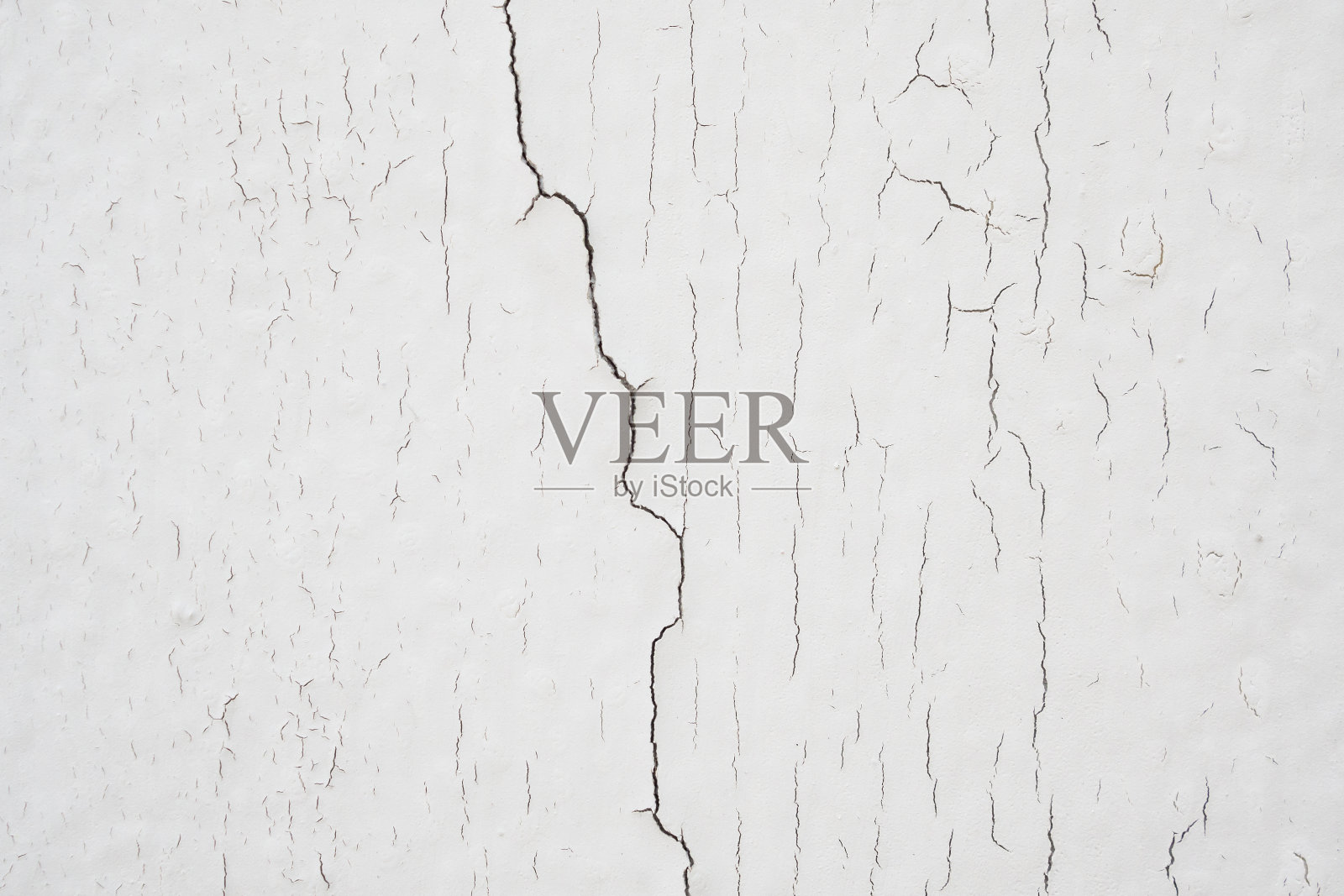 白色墙体纹理背景上的裂缝混凝土照片摄影图片