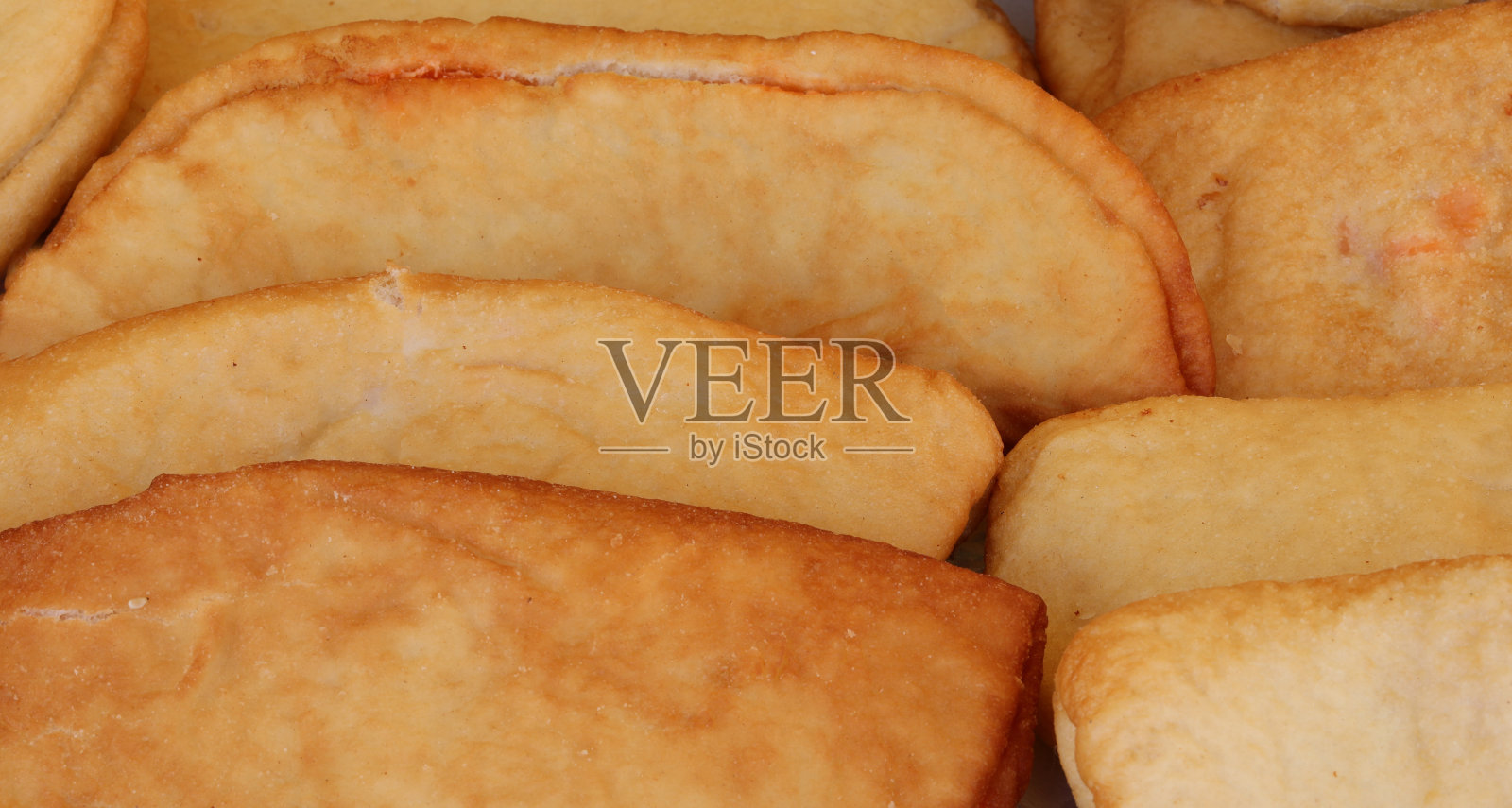 典型的食物叫做 包装好的水果馅小酥饼类似于意大利馅饼照片摄影图片