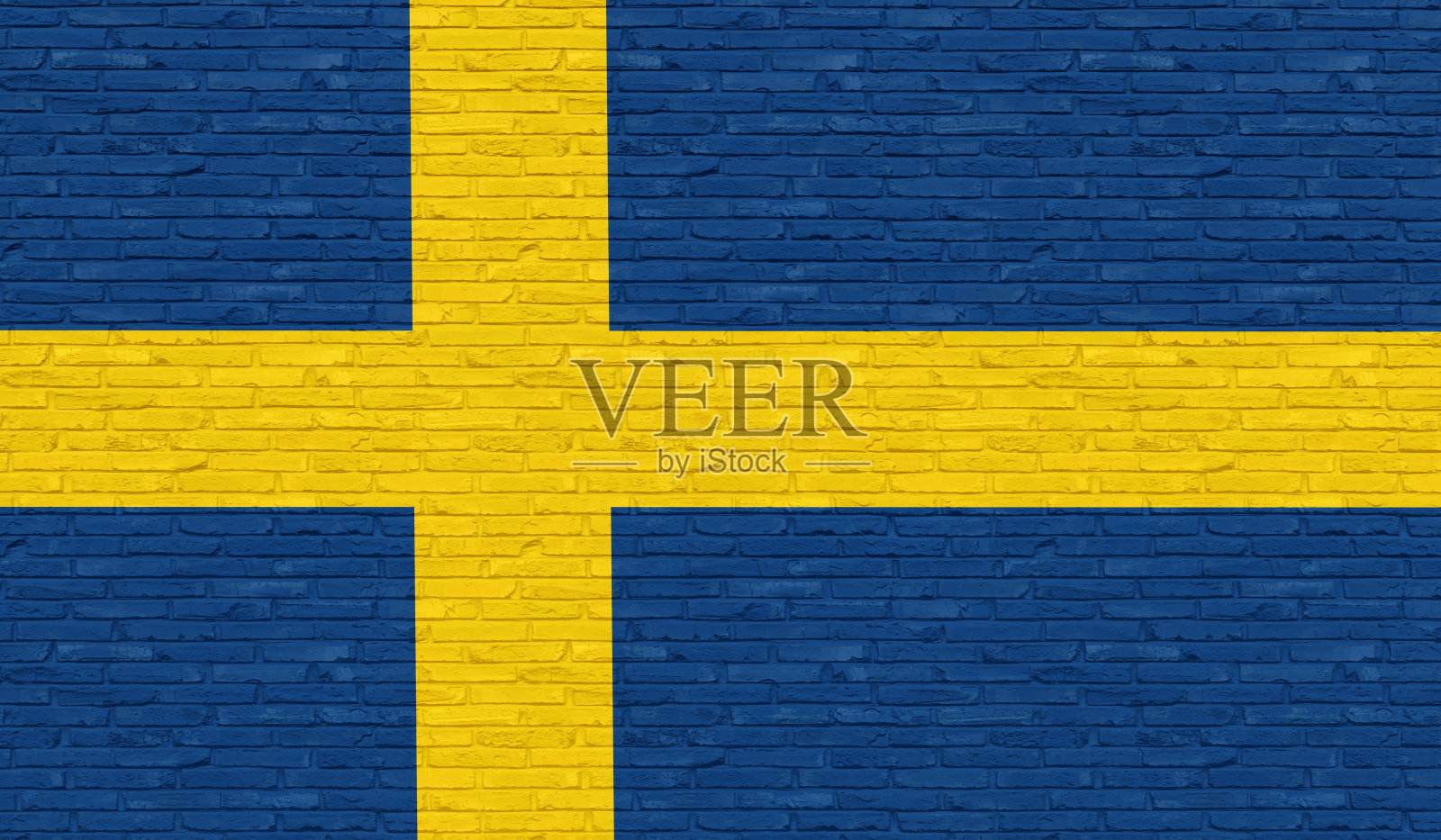 砖墙上绘有瑞典国旗。照片摄影图片