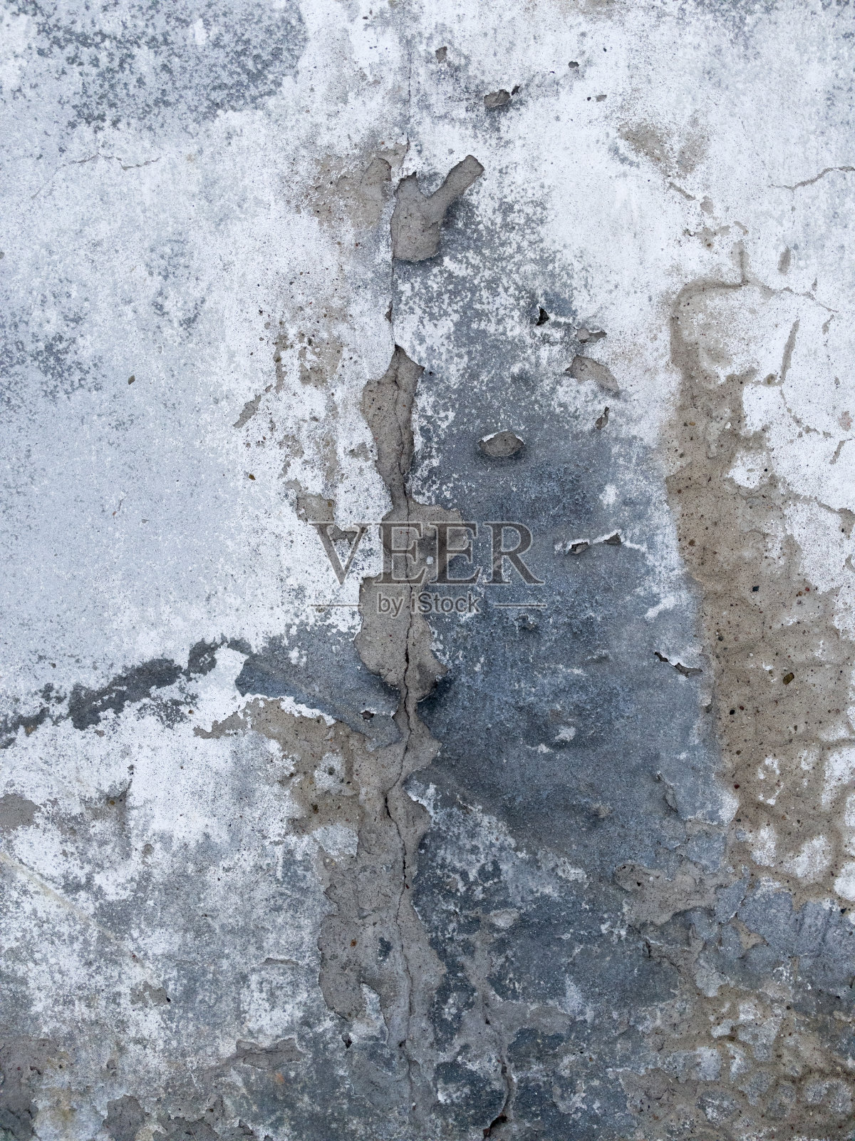 旧脏墙的残片,有划痕和裂缝。照片摄影图片