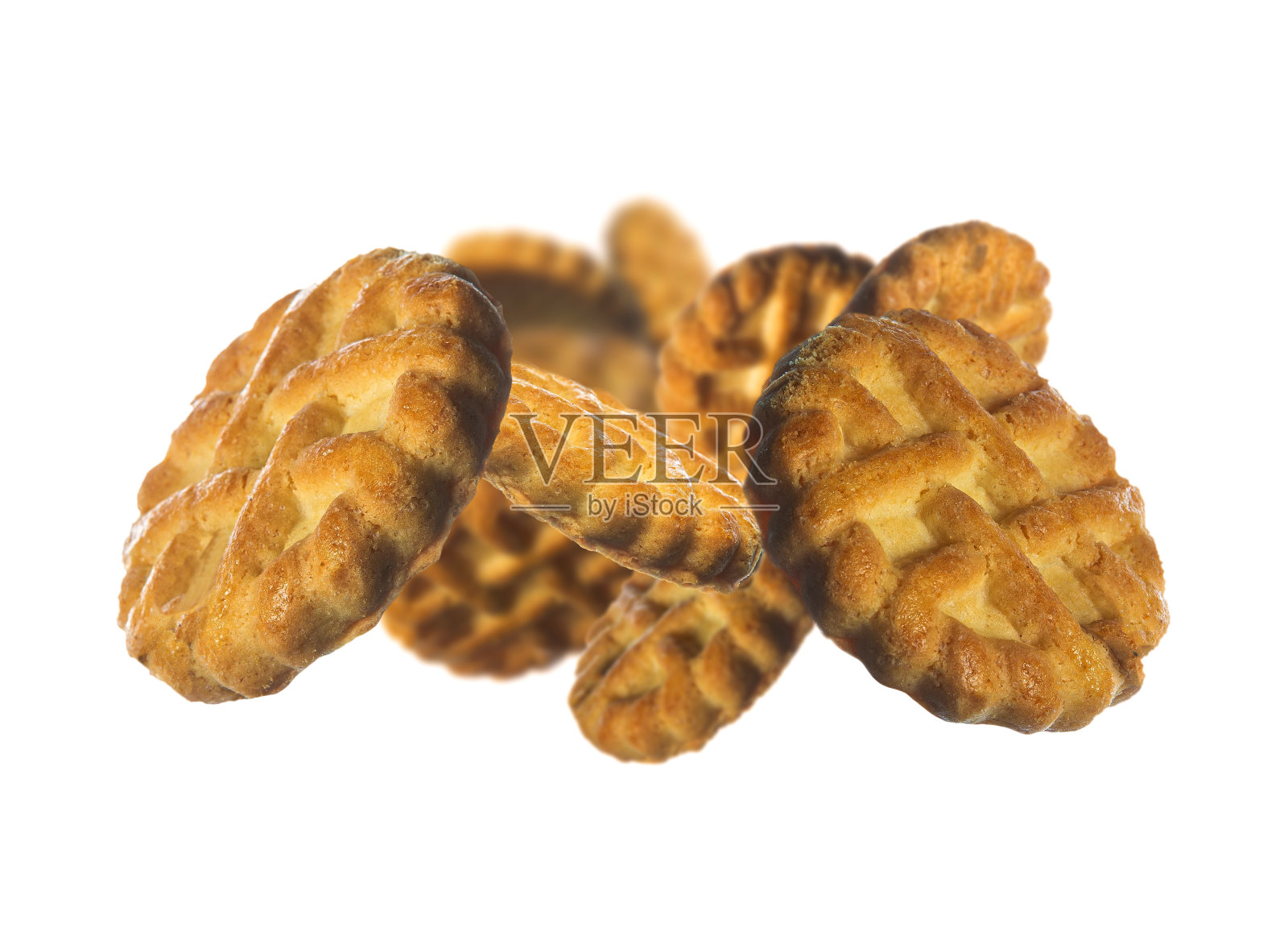 收集黄油饼干爆炸孤立的白色背景。有选择性的重点照片摄影图片