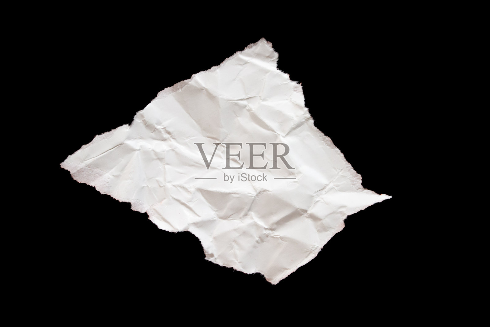 撕裂的纸片孤立在黑色背景上照片摄影图片