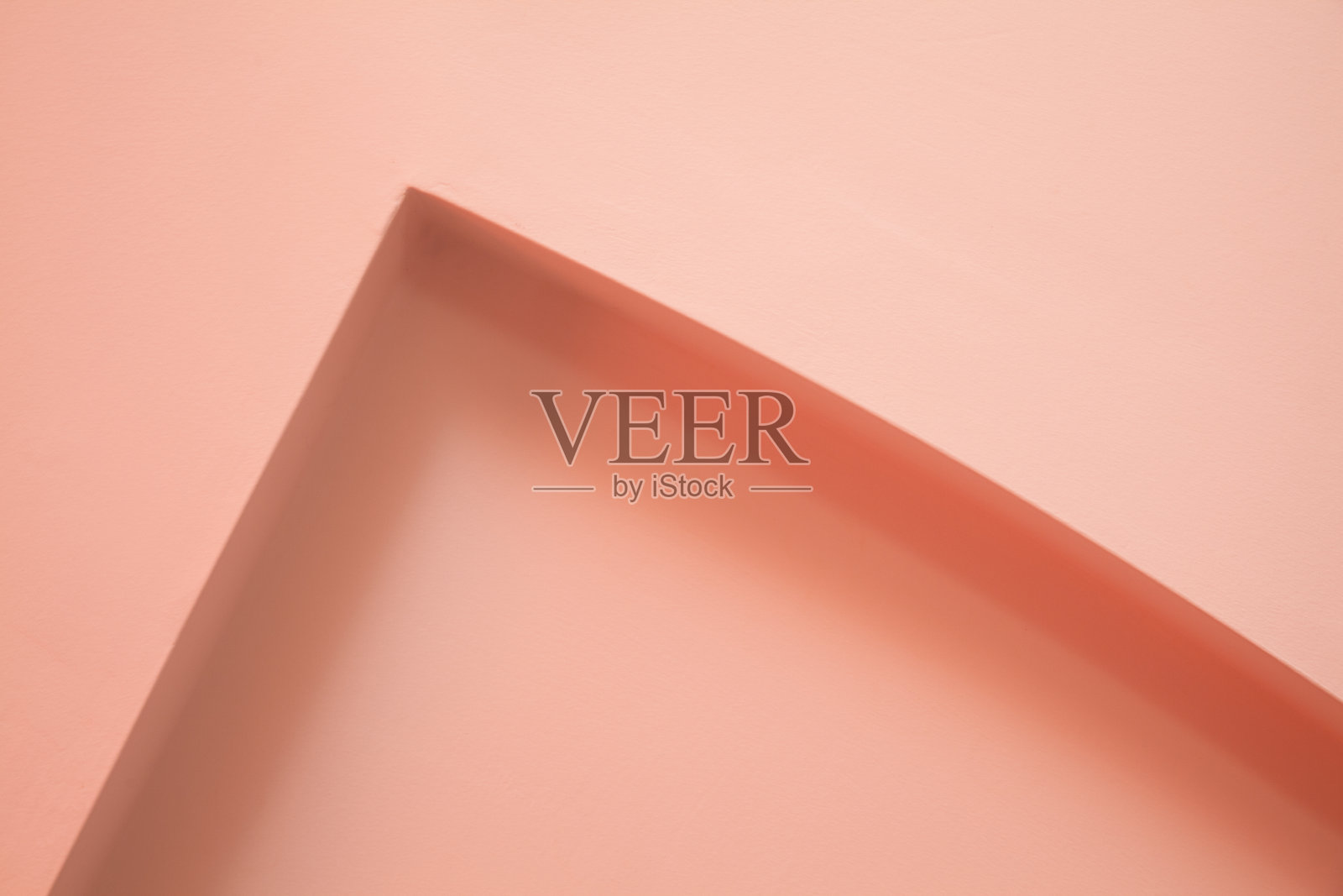 抽象的建筑背景,粉红色的内部碎片。小角落照片摄影图片