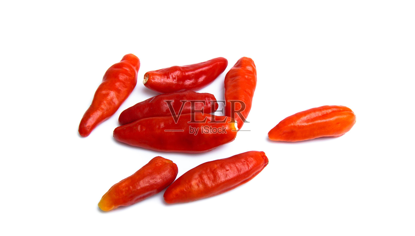 白色背景上的辣椒。照片摄影图片