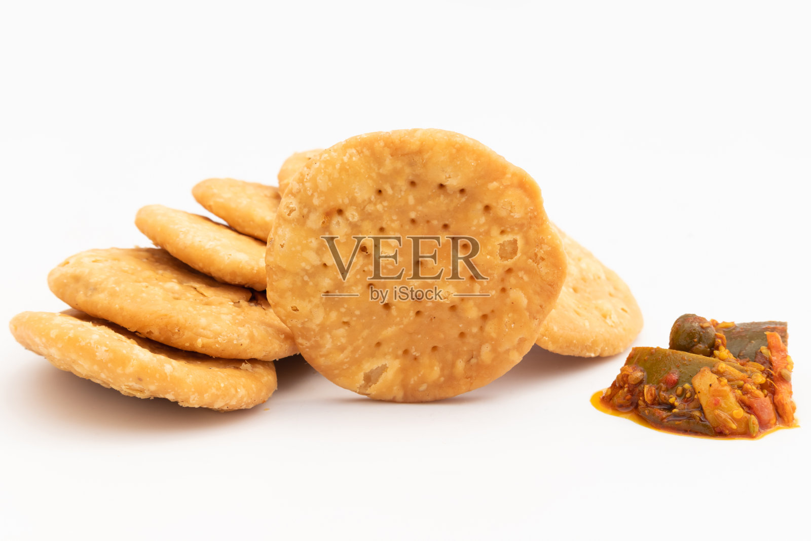 也被称为Matthi, Mathiya, Mathi, Farsi Poori, Farsan, Pharsa或Mathari是著名的茶时间,无麸质零食主要在排灯节,洒红节,Karwa Chauth等节日期间消费照片摄影图片