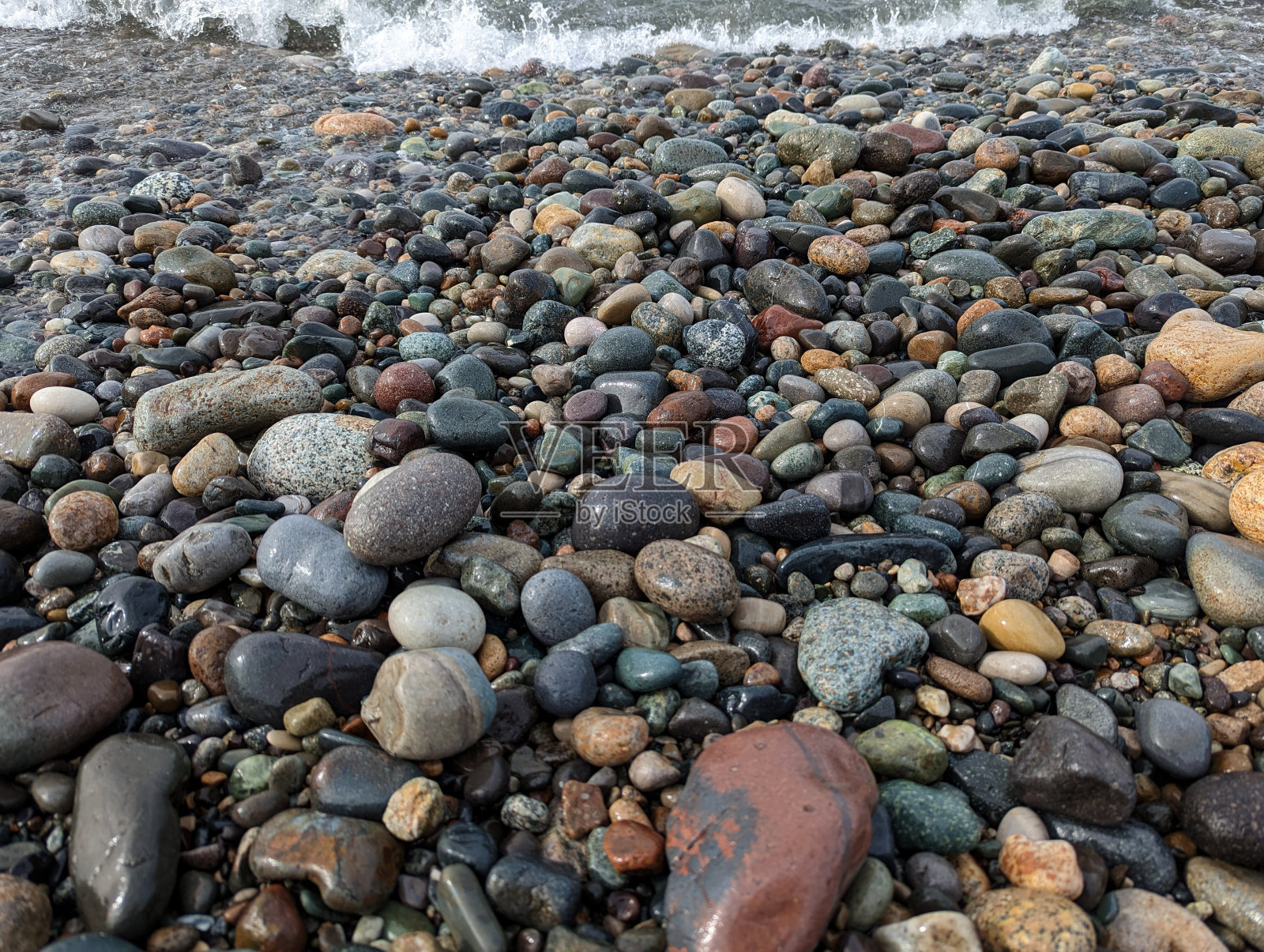 黑海的卵石海滩照片摄影图片