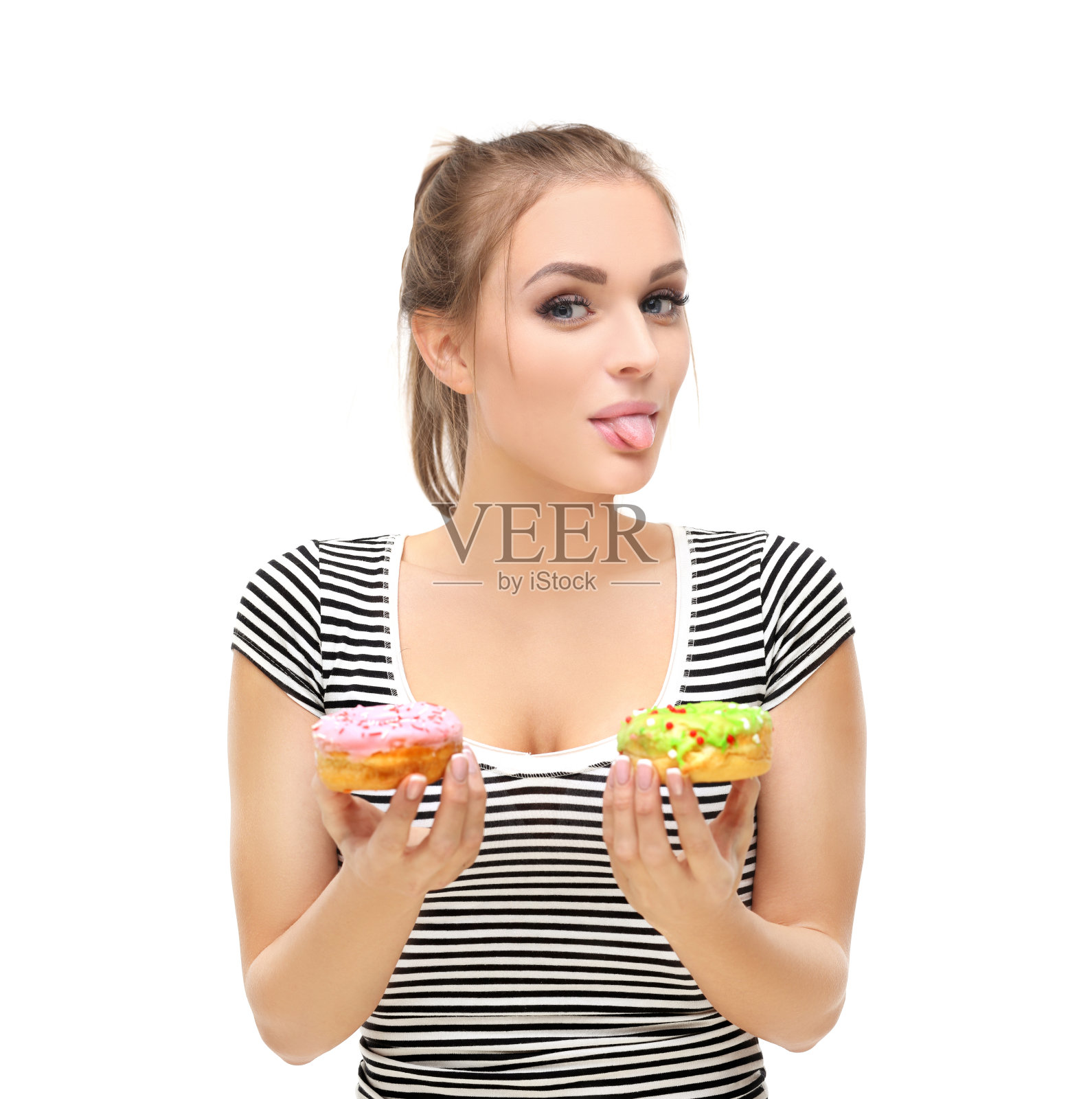 有趣的女孩和五颜六色的甜甜圈。照片摄影图片