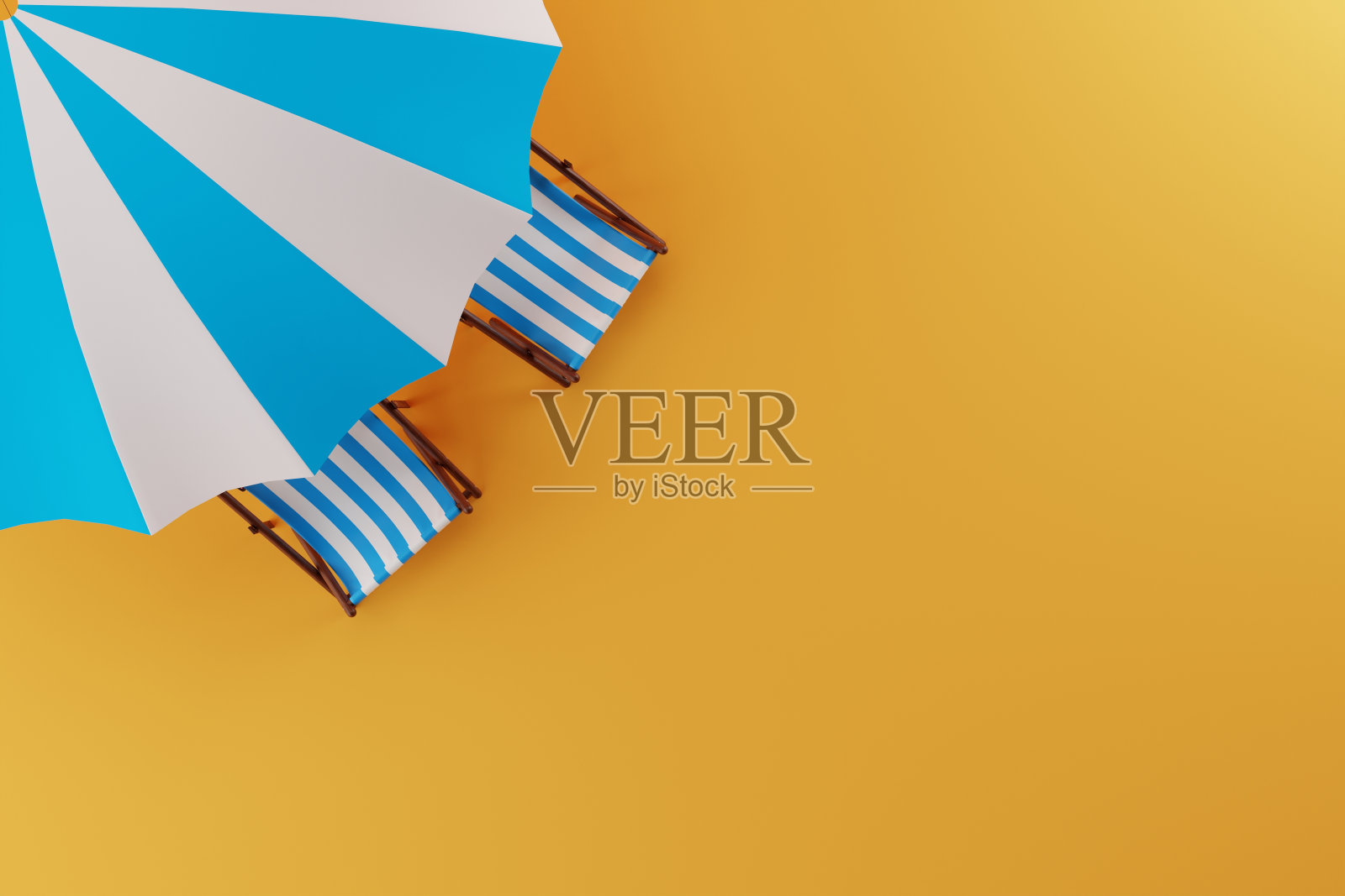 太阳伞和太阳躺椅的俯视图。照片摄影图片