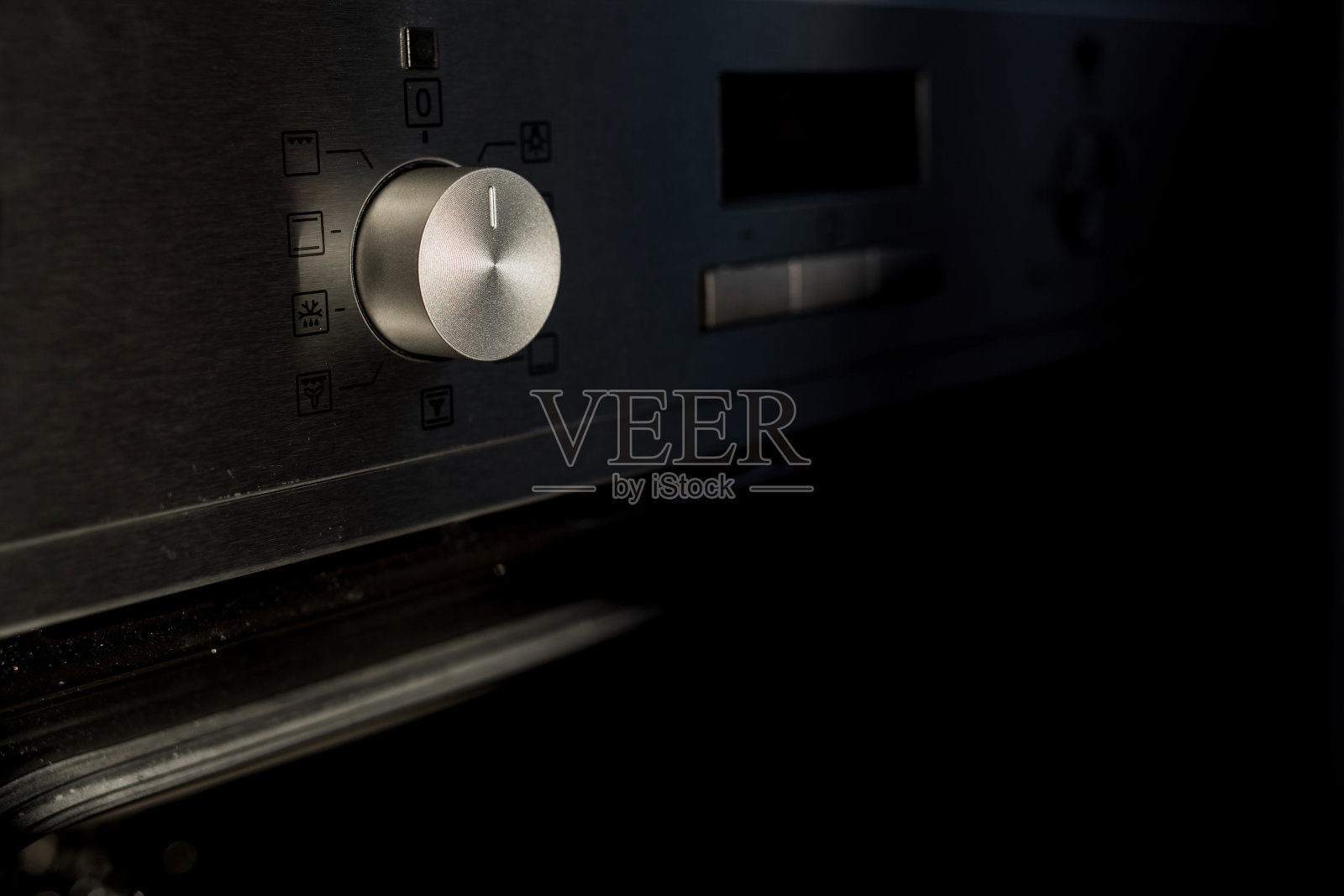 烤箱上的温度调节照片摄影图片