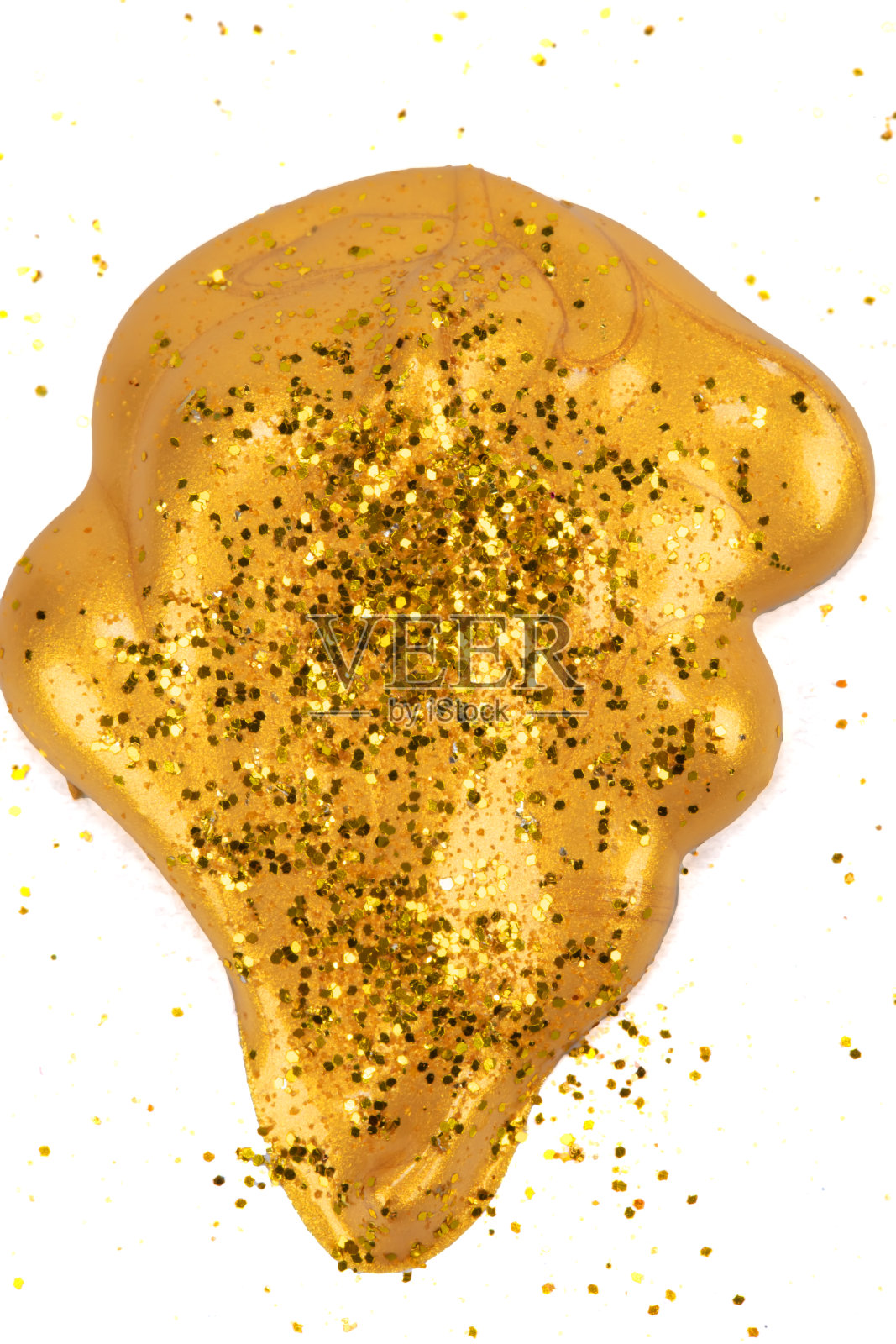 化妆品黄金点。金色闪光油漆色块隔离在白色背景上照片摄影图片