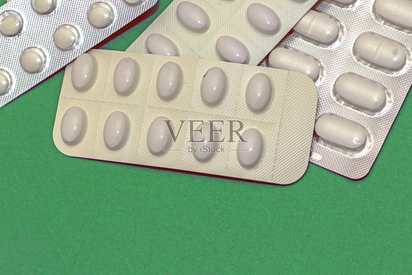 药片堆积成白色水泡照片摄影图片