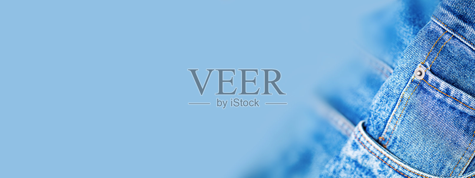 一个denium蓝色牛仔裤口袋特写,横幅与文字空间照片摄影图片