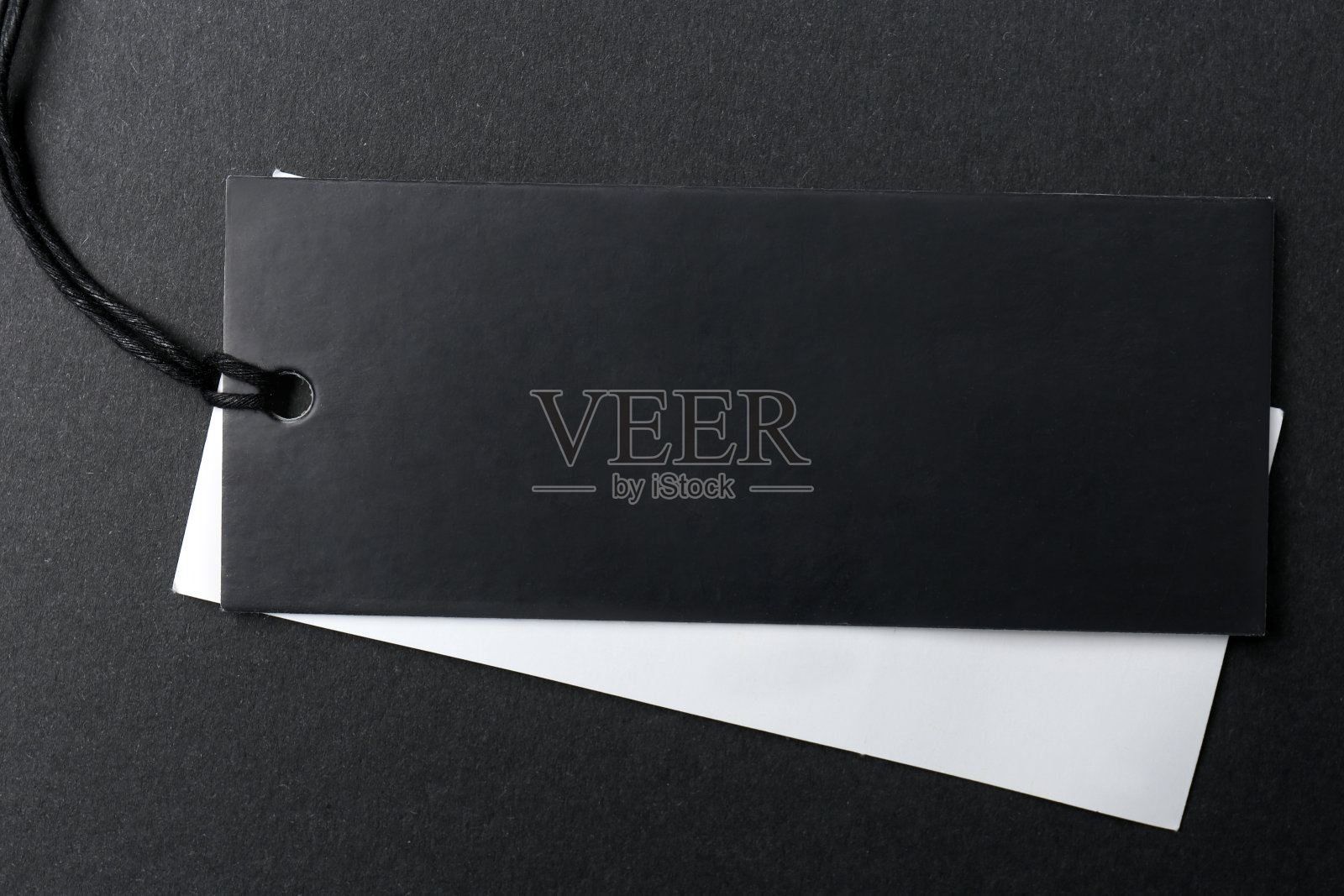 标签与空白的文字在黑色背景,俯视图照片摄影图片