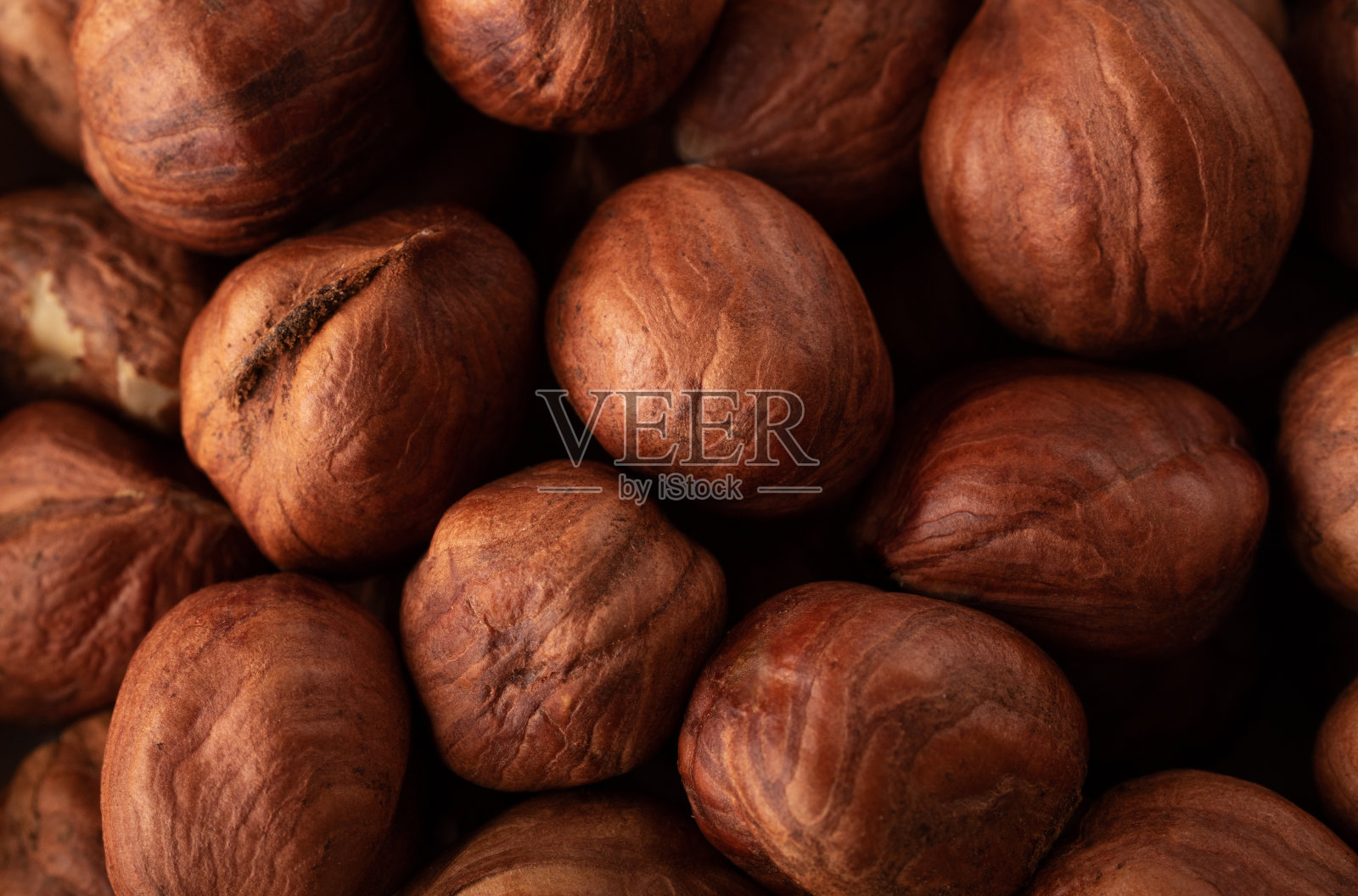 美味的去皮干榛子仁。照片摄影图片