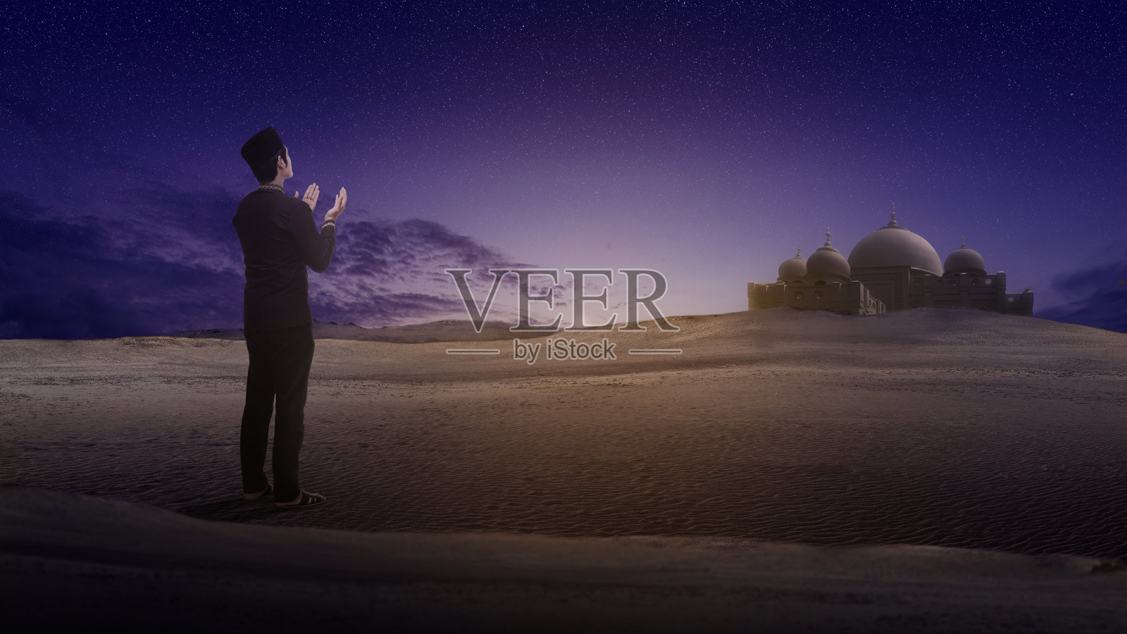 举手祈祷的穆斯林男子照片摄影图片