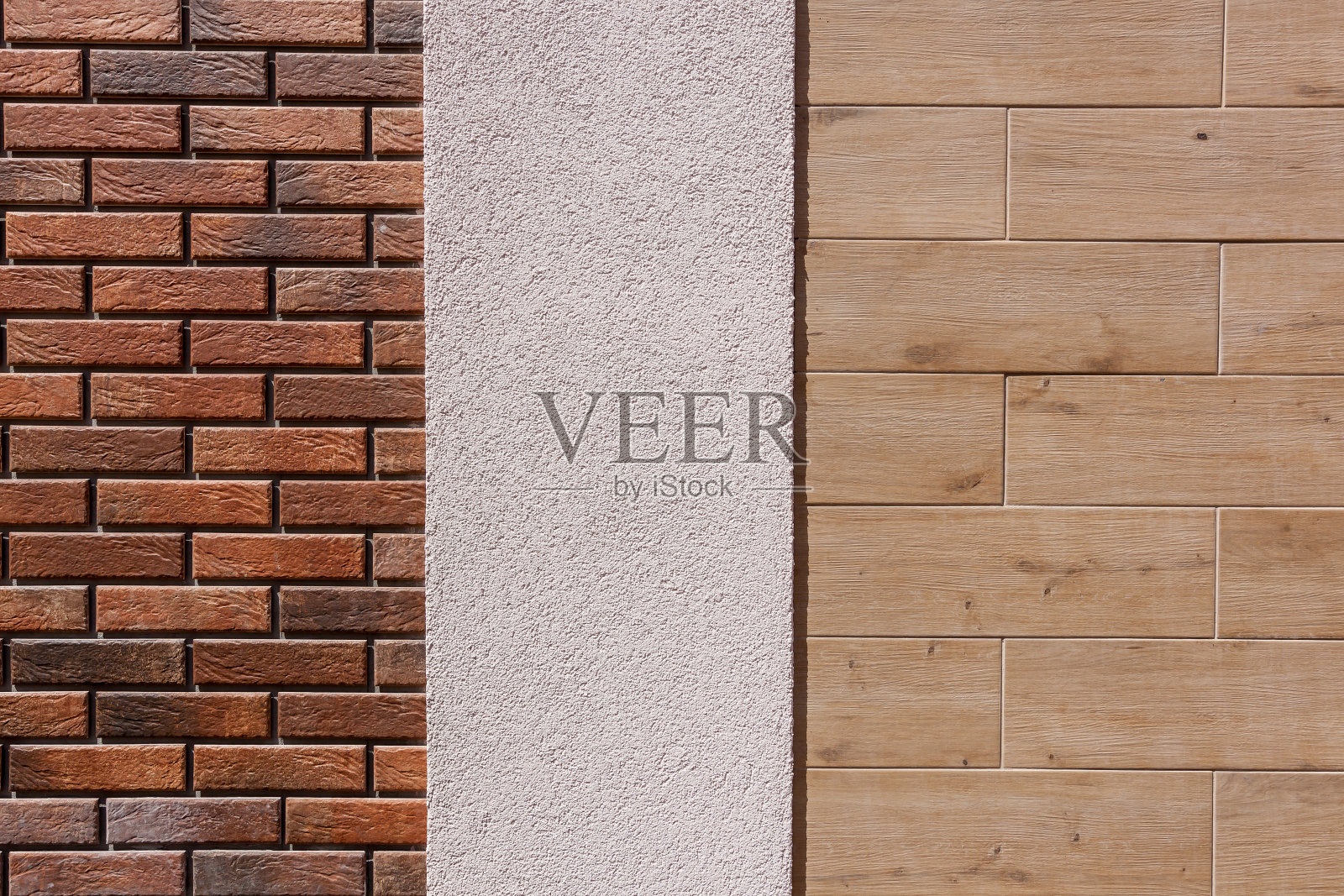 不同纹理的外墙装饰的房子的墙壁照片摄影图片