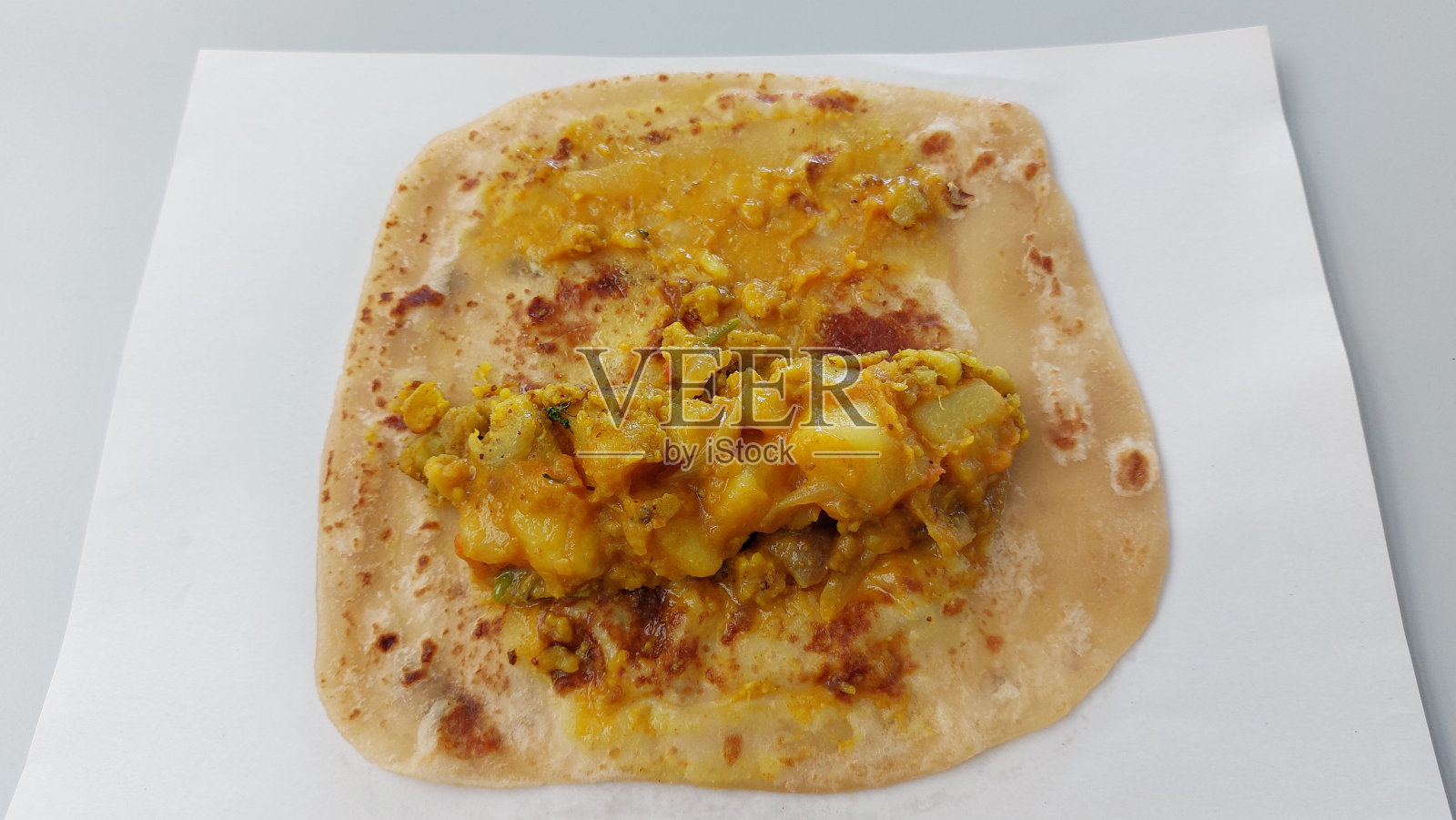 烤饼配辣味印度素食咖喱照片摄影图片