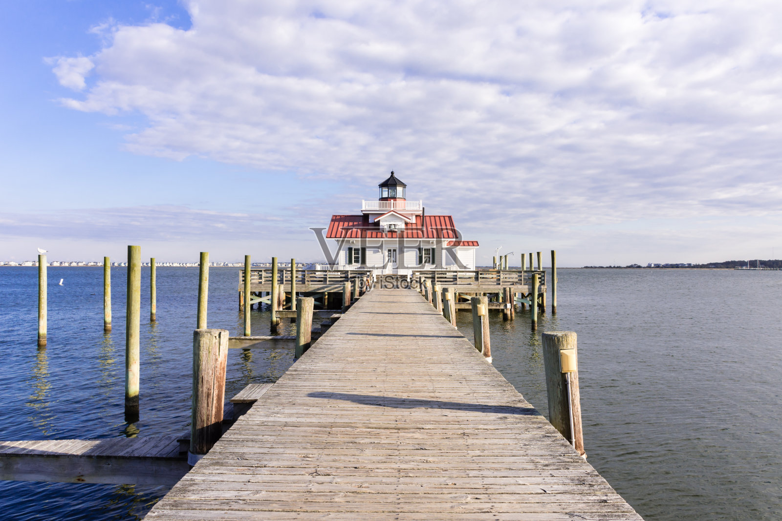夕阳照在罗阿诺克沼泽灯塔上照片摄影图片