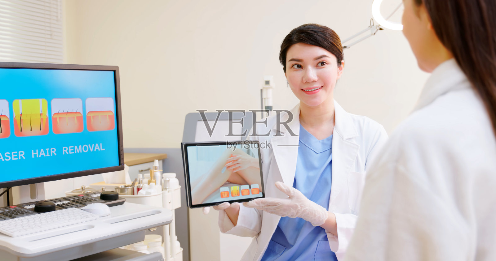 女性腿部激光脱毛照片摄影图片