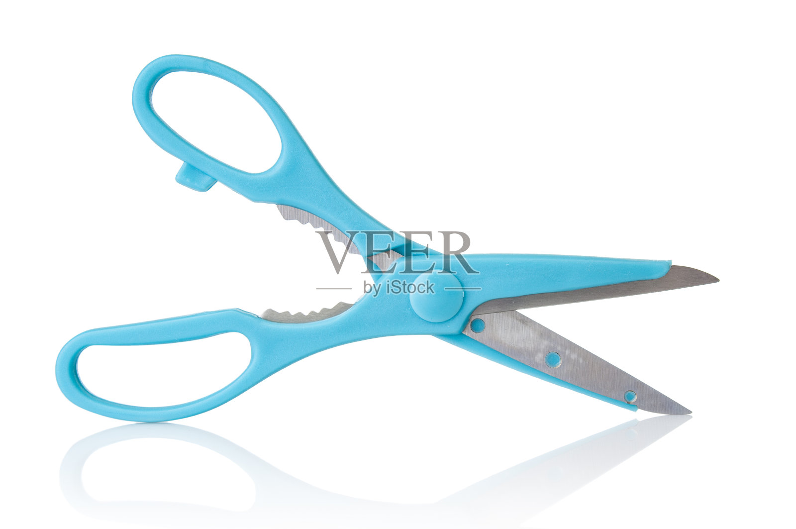 白色背景上的蓝色剪子特写照片摄影图片