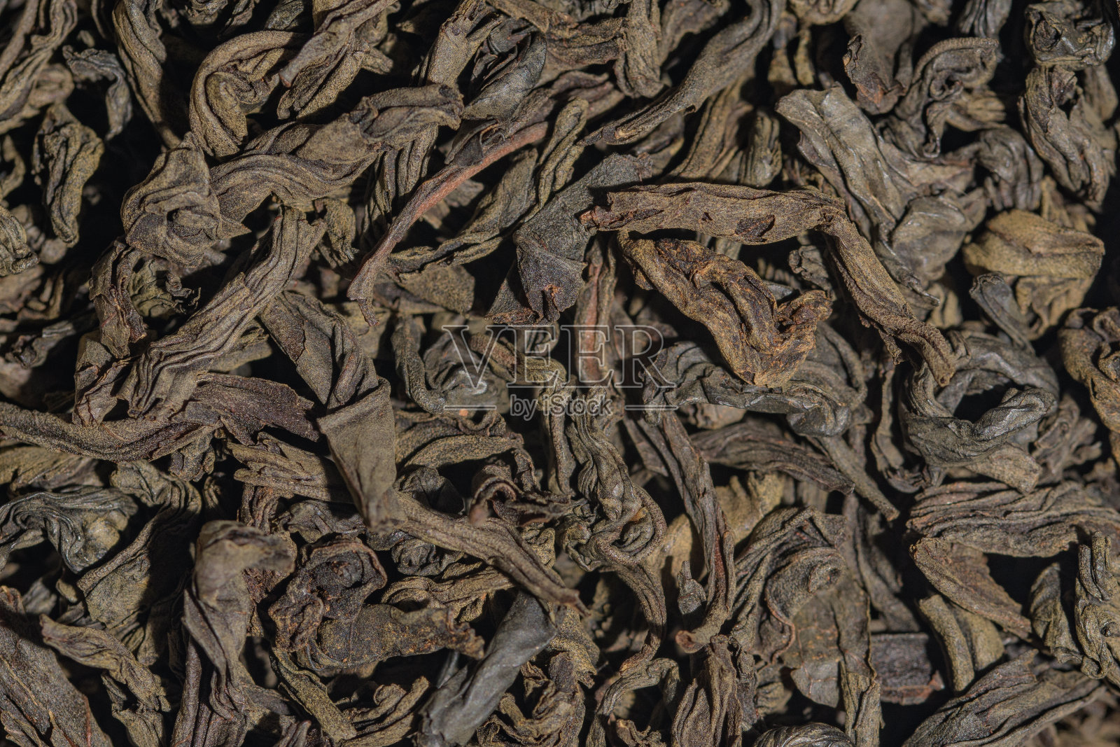 暗背景壁纸与茶叶宏照片摄影图片