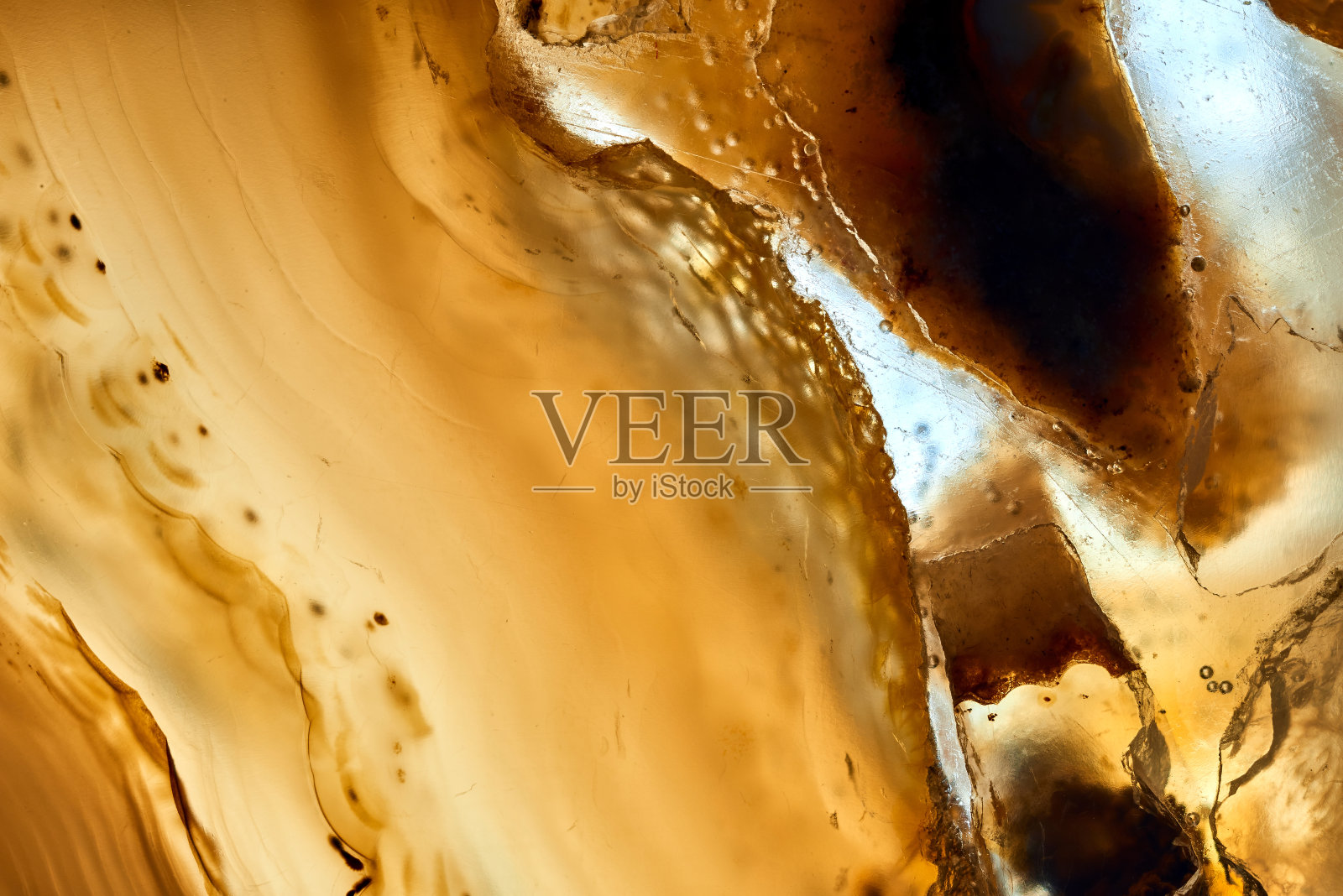 黄色首饰材质的特写镜头,色彩艳丽,美观大方。照片摄影图片