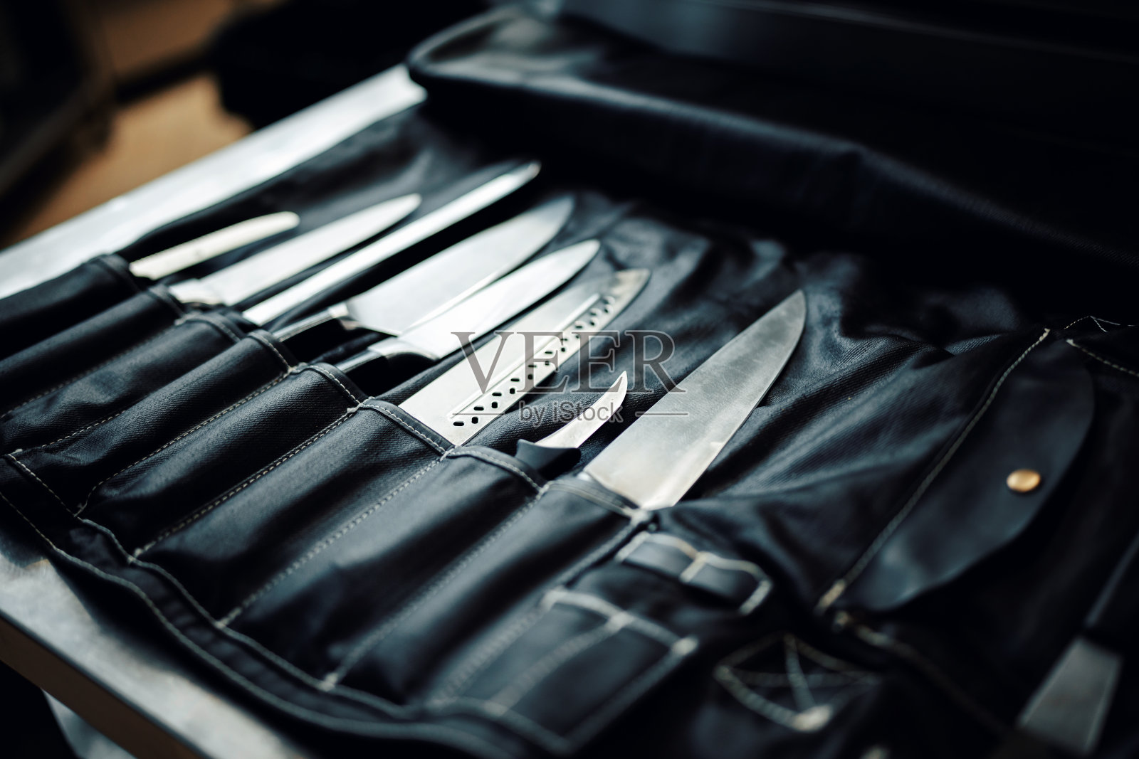 Set of chef knives in bag照片摄影图片