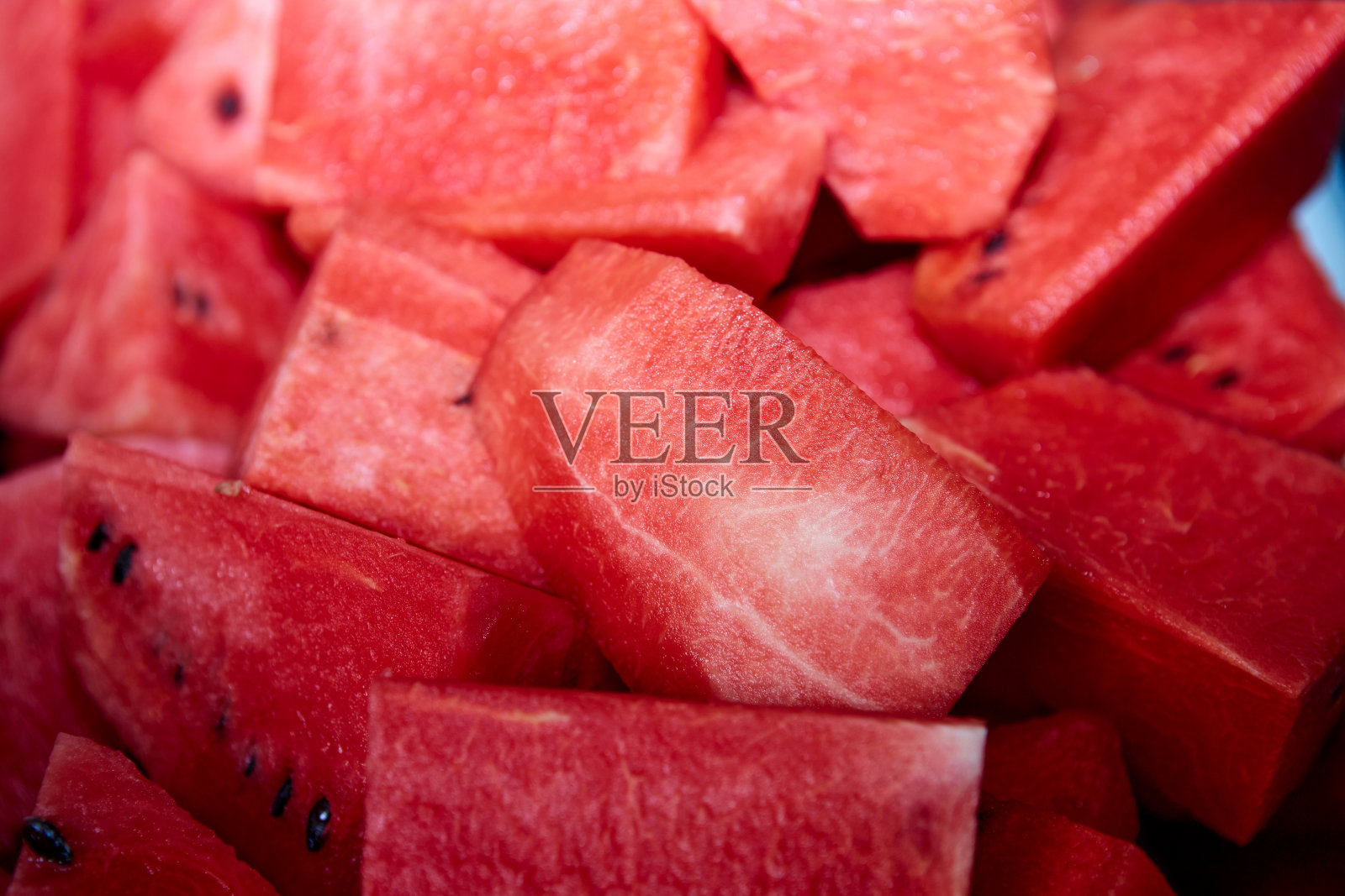 切西瓜照片摄影图片