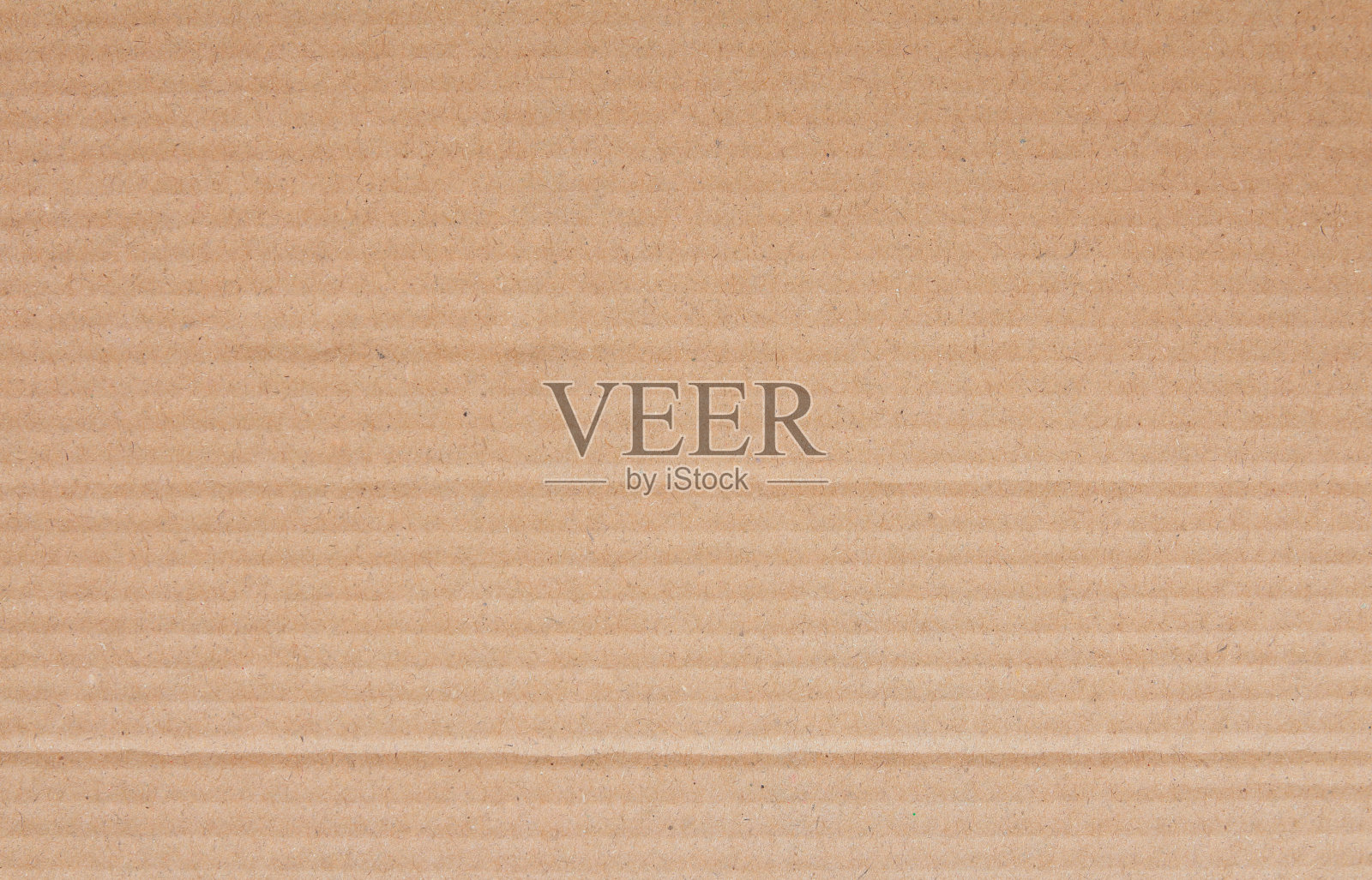 硬纸板纹理背景,细部回收牛皮纸盒图案。照片摄影图片