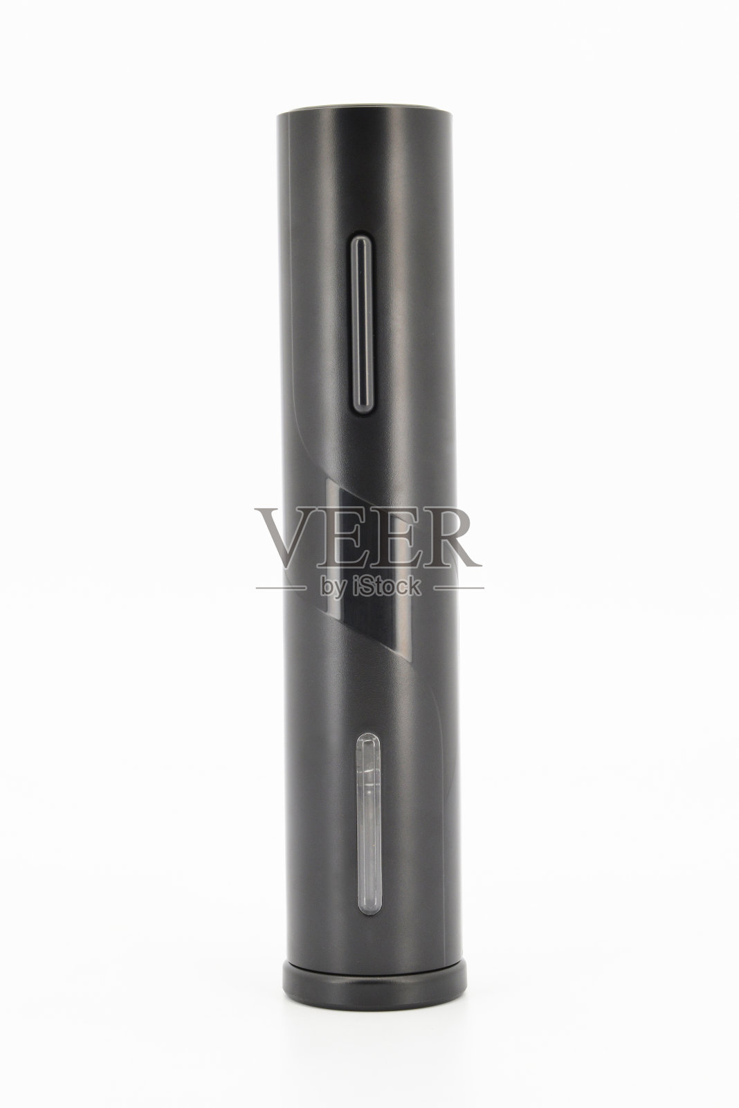 自动开瓶器,用于开瓶盖。电动开瓶器。照片摄影图片