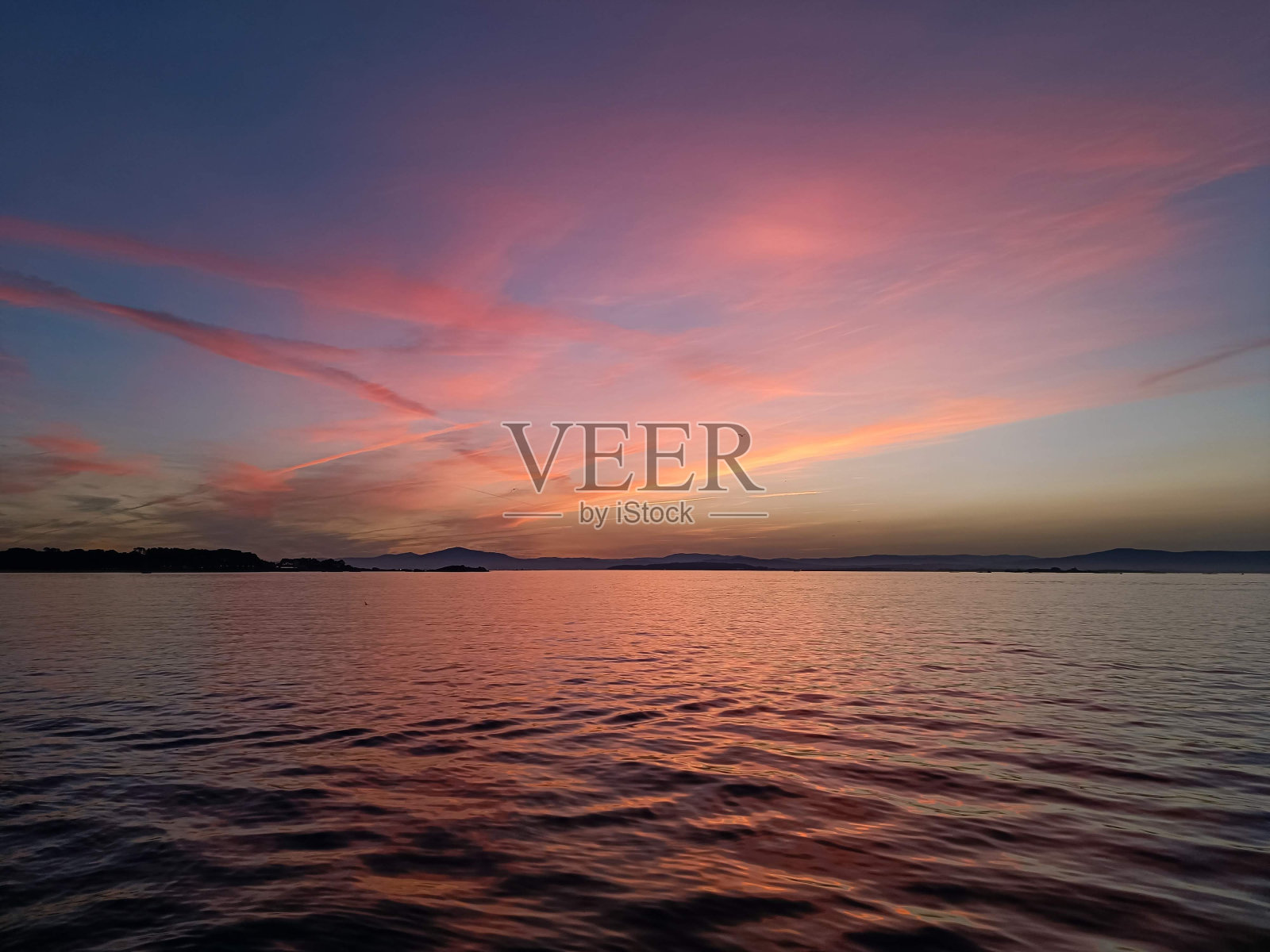 科罗索里贝拉海滩上的日出照片摄影图片