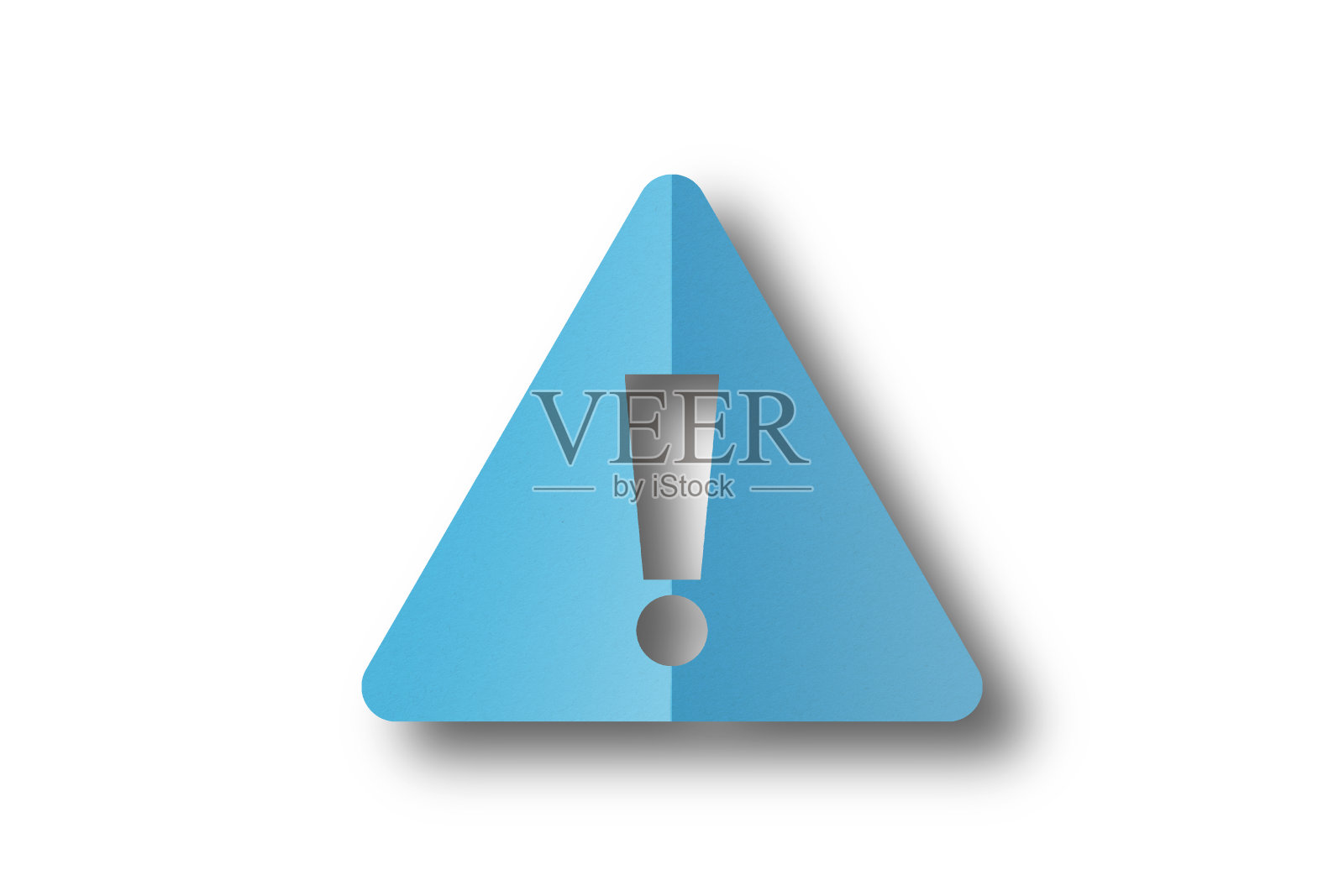 浅蓝色的纸打孔成感叹号的形状。白色背景上孤立的警告标志照片摄影图片