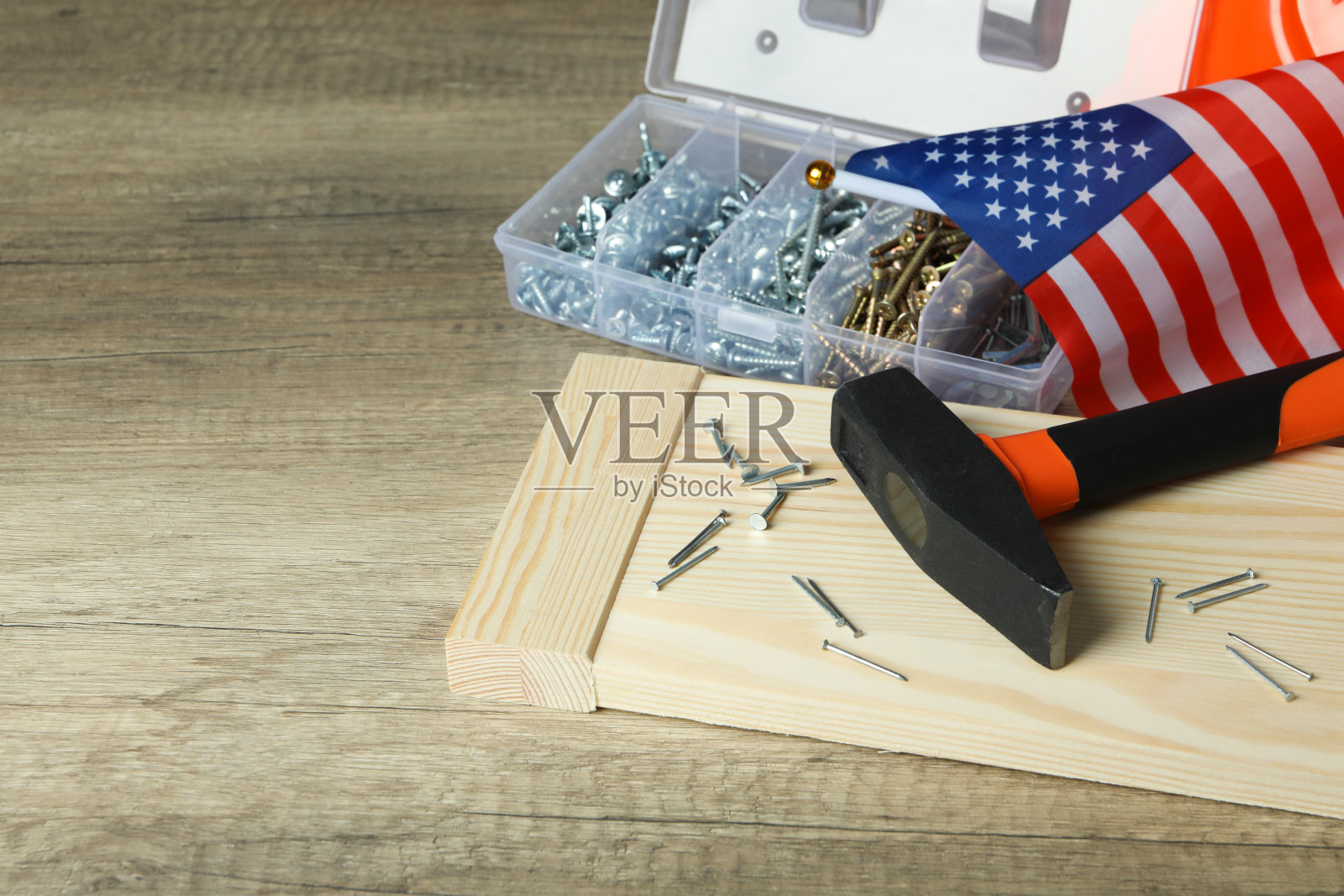 木制背景上的劳动节概念照片摄影图片