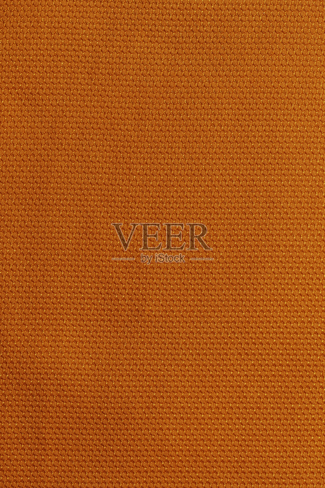 橙色运动服装面料足球衫球衣纹理和纺织背景。照片摄影图片