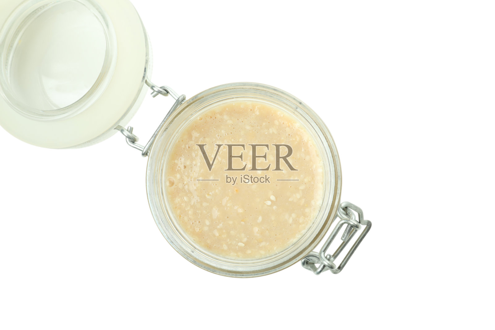 白底孤立的罐子里的芝麻酱照片摄影图片