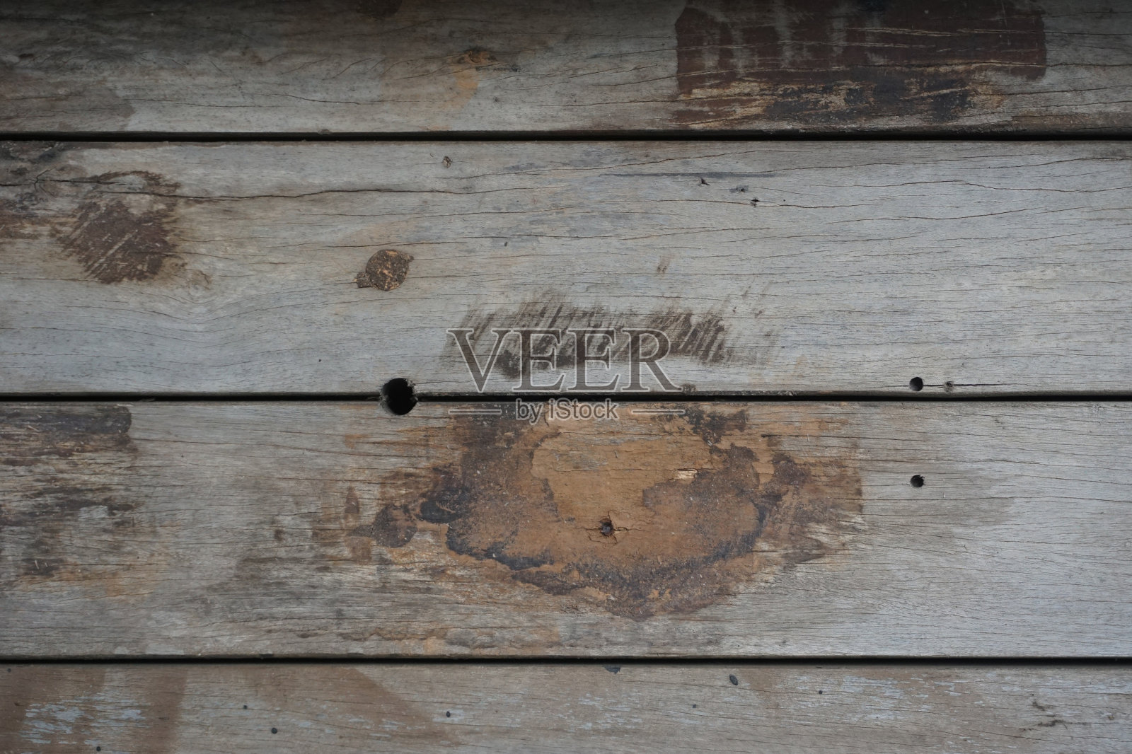褐色木板墙面纹理背景。白蚁吃木头。照片摄影图片