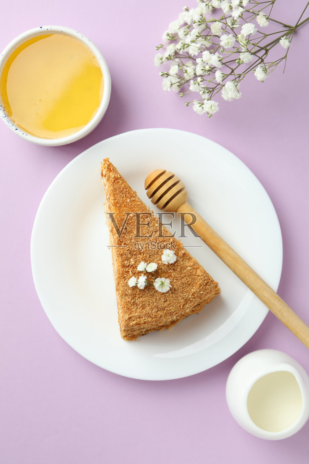 概念美味的甜点与蜂蜜蛋糕,俯视图照片摄影图片