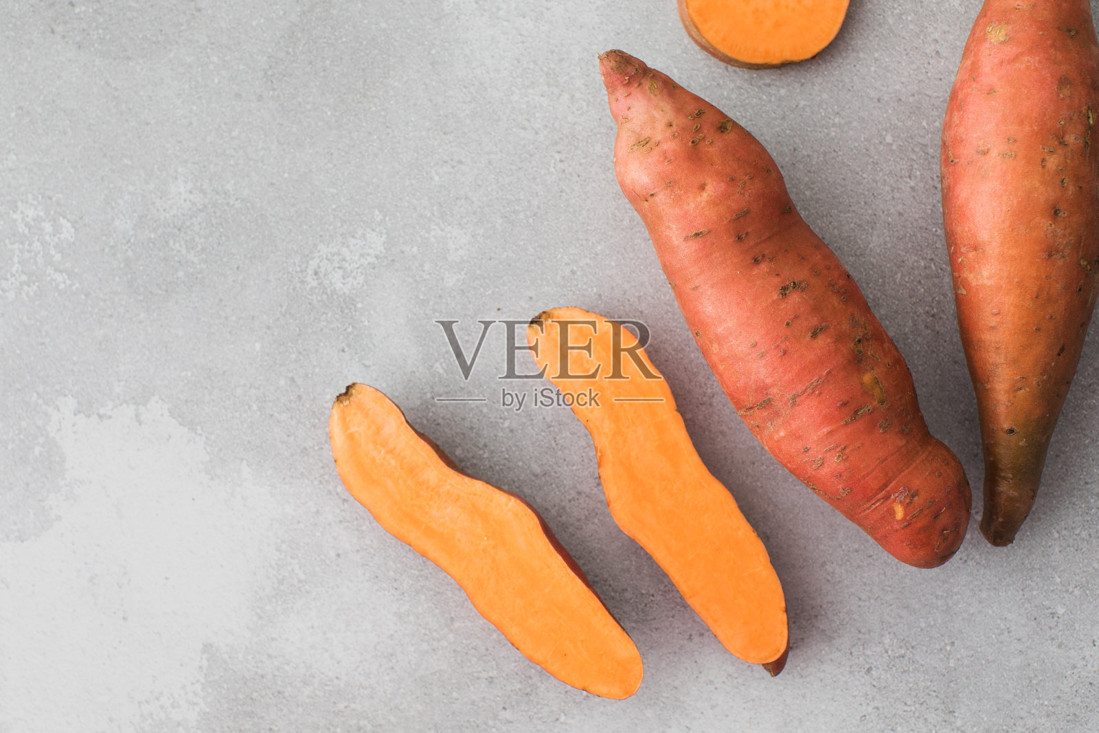 生红薯整块切好。桔子库马拉,红薯。块根作物的收获。本空间照片摄影图片