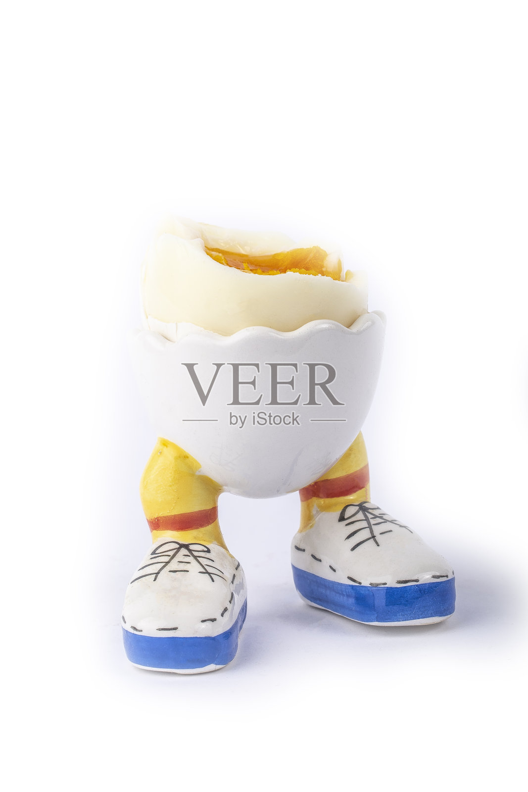 煮熟的鸡蛋开一半,腿分开照片摄影图片